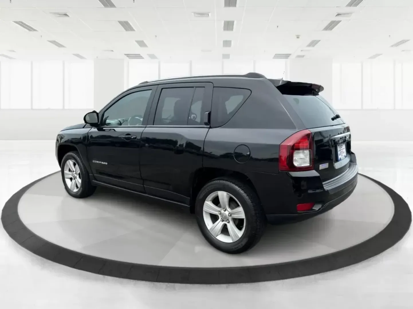 2014 Jeep Compass Latitude (1C4NJCEB4ED) with an Other engine, located at 1099 N County Rd 25A, Troy, OH, 45373, (937) 908-9800, 40.057079, -84.212883 - **Adventure Awaits in This Versatile 2014 Jeep Compass Latitude! Ideal for Family Outings and Weekend Getaways!**<br /> <br /> Are you ready to elevate your lifestyle with a vehicle that seamlessly fits into your adventures? Look no further than this robust 2014 Jeep Compass Latitude, available now - Photo#4