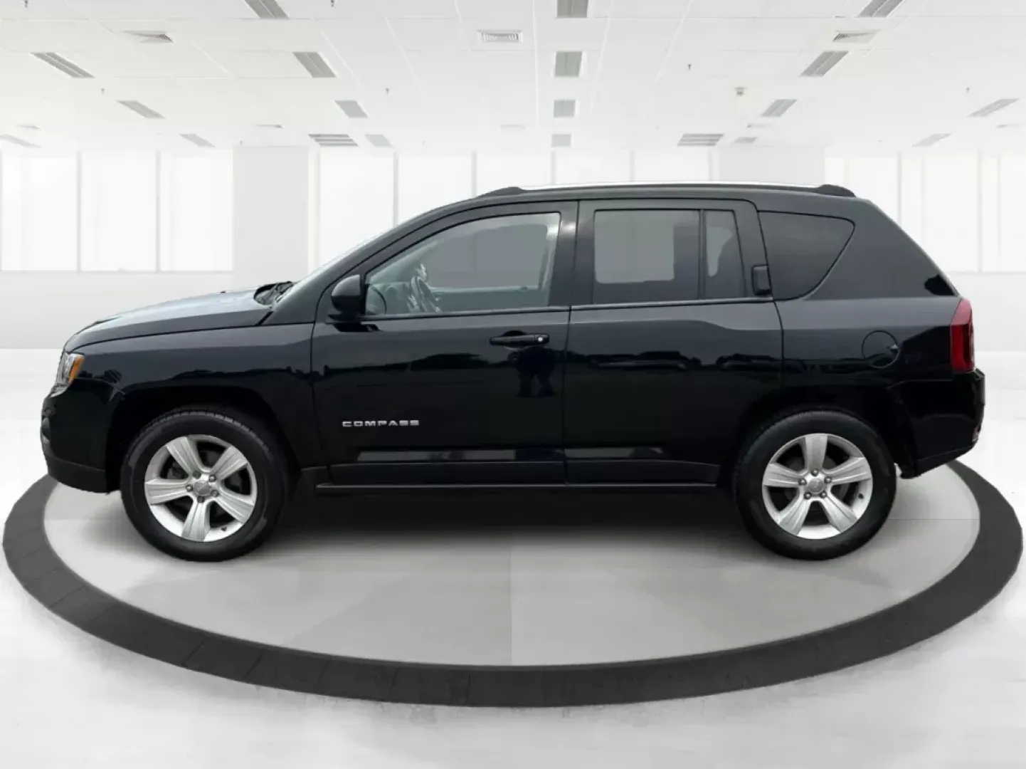 2014 Jeep Compass Latitude (1C4NJCEB4ED) with an Other engine, located at 1099 N County Rd 25A, Troy, OH, 45373, (937) 908-9800, 40.057079, -84.212883 - **Adventure Awaits in This Versatile 2014 Jeep Compass Latitude! Ideal for Family Outings and Weekend Getaways!**<br /> <br /> Are you ready to elevate your lifestyle with a vehicle that seamlessly fits into your adventures? Look no further than this robust 2014 Jeep Compass Latitude, available now - Photo#5