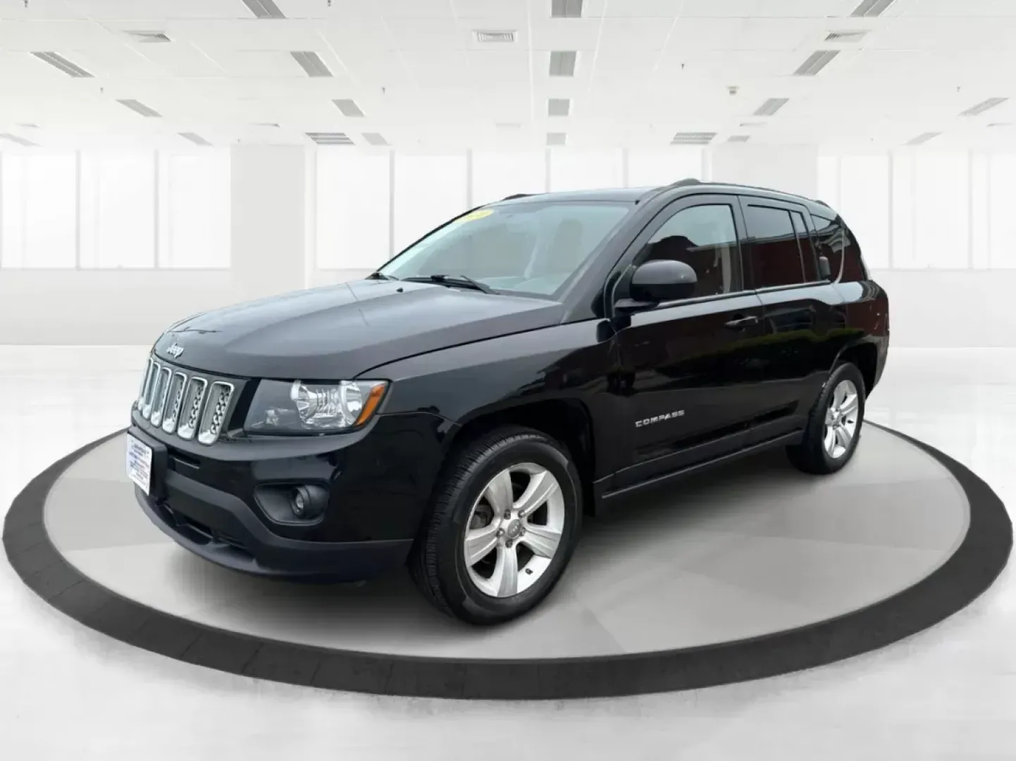 2014 Jeep Compass Latitude (1C4NJCEB4ED) with an Other engine, located at 1099 N County Rd 25A, Troy, OH, 45373, (937) 908-9800, 40.057079, -84.212883 - **Adventure Awaits in This Versatile 2014 Jeep Compass Latitude! Ideal for Family Outings and Weekend Getaways!**<br /> <br /> Are you ready to elevate your lifestyle with a vehicle that seamlessly fits into your adventures? Look no further than this robust 2014 Jeep Compass Latitude, available now - Photo#7