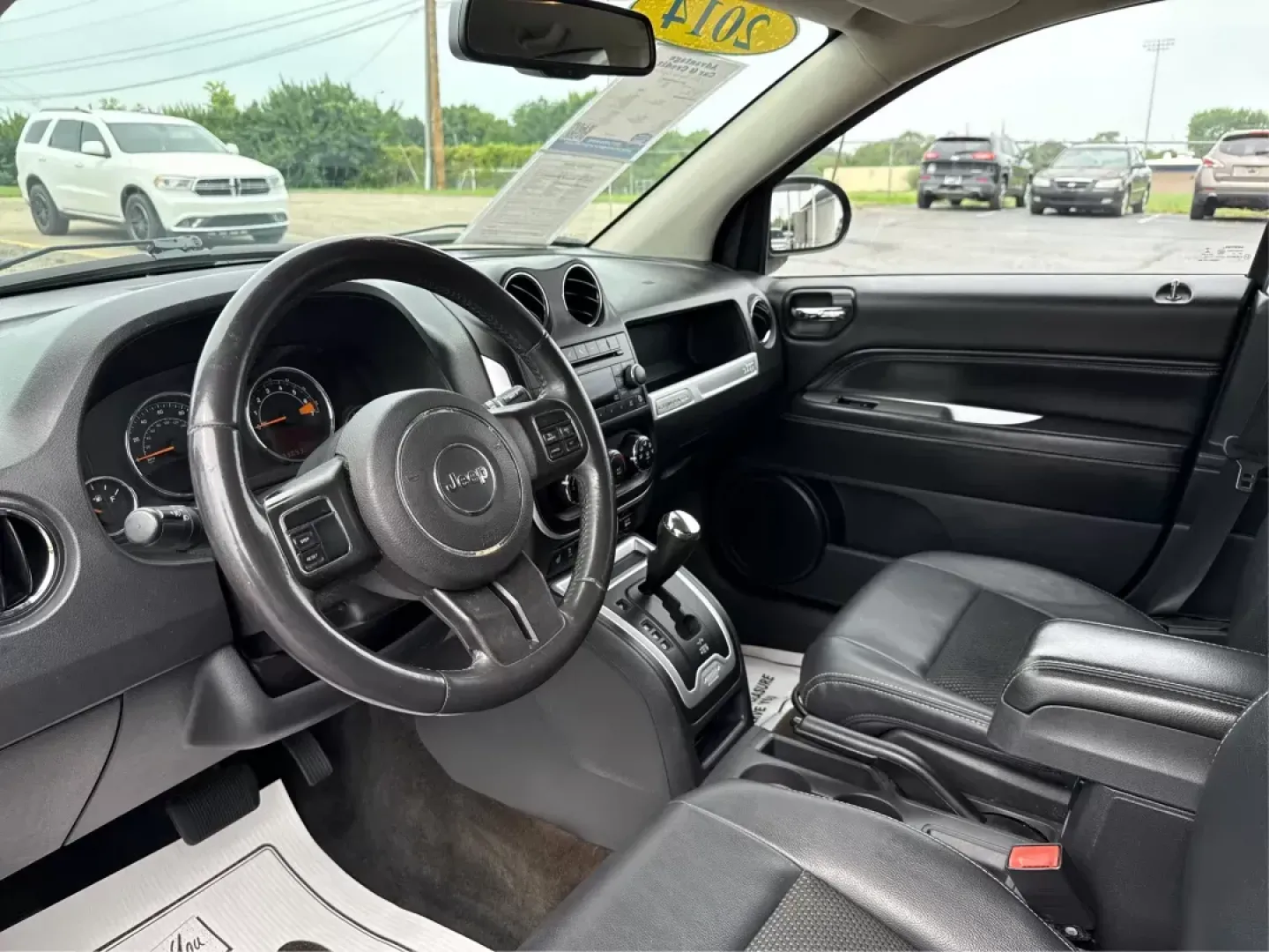 2014 Jeep Compass Latitude (1C4NJCEB4ED) with an Other engine, located at 1099 N County Rd 25A, Troy, OH, 45373, (937) 908-9800, 40.057079, -84.212883 - **Adventure Awaits in This Versatile 2014 Jeep Compass Latitude! Ideal for Family Outings and Weekend Getaways!**<br /> <br /> Are you ready to elevate your lifestyle with a vehicle that seamlessly fits into your adventures? Look no further than this robust 2014 Jeep Compass Latitude, available now - Photo#8