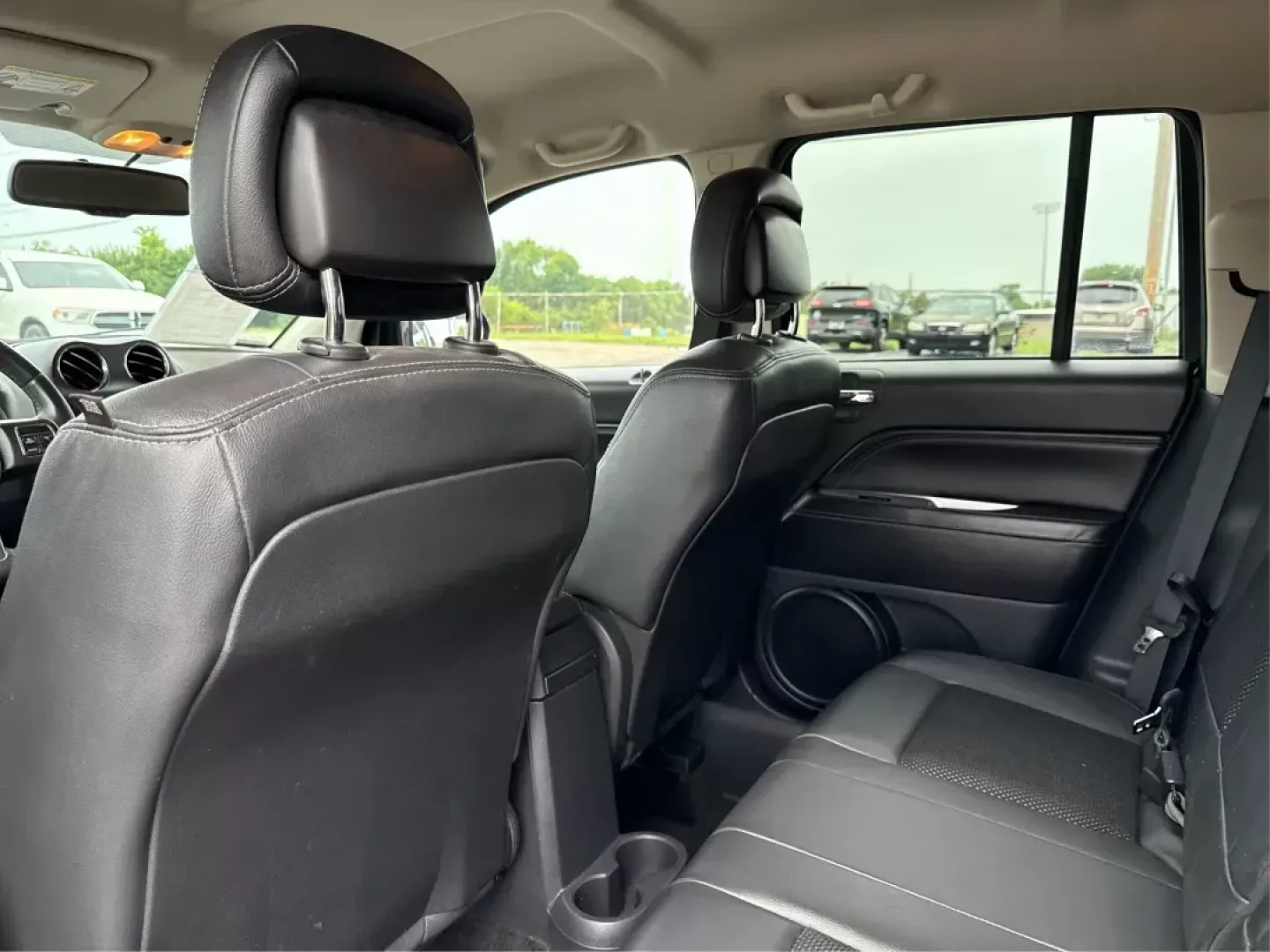 2014 Jeep Compass Latitude (1C4NJCEB4ED) with an Other engine, located at 1099 N County Rd 25A, Troy, OH, 45373, (937) 908-9800, 40.057079, -84.212883 - **Adventure Awaits in This Versatile 2014 Jeep Compass Latitude! Ideal for Family Outings and Weekend Getaways!**<br /> <br /> Are you ready to elevate your lifestyle with a vehicle that seamlessly fits into your adventures? Look no further than this robust 2014 Jeep Compass Latitude, available now - Photo#9