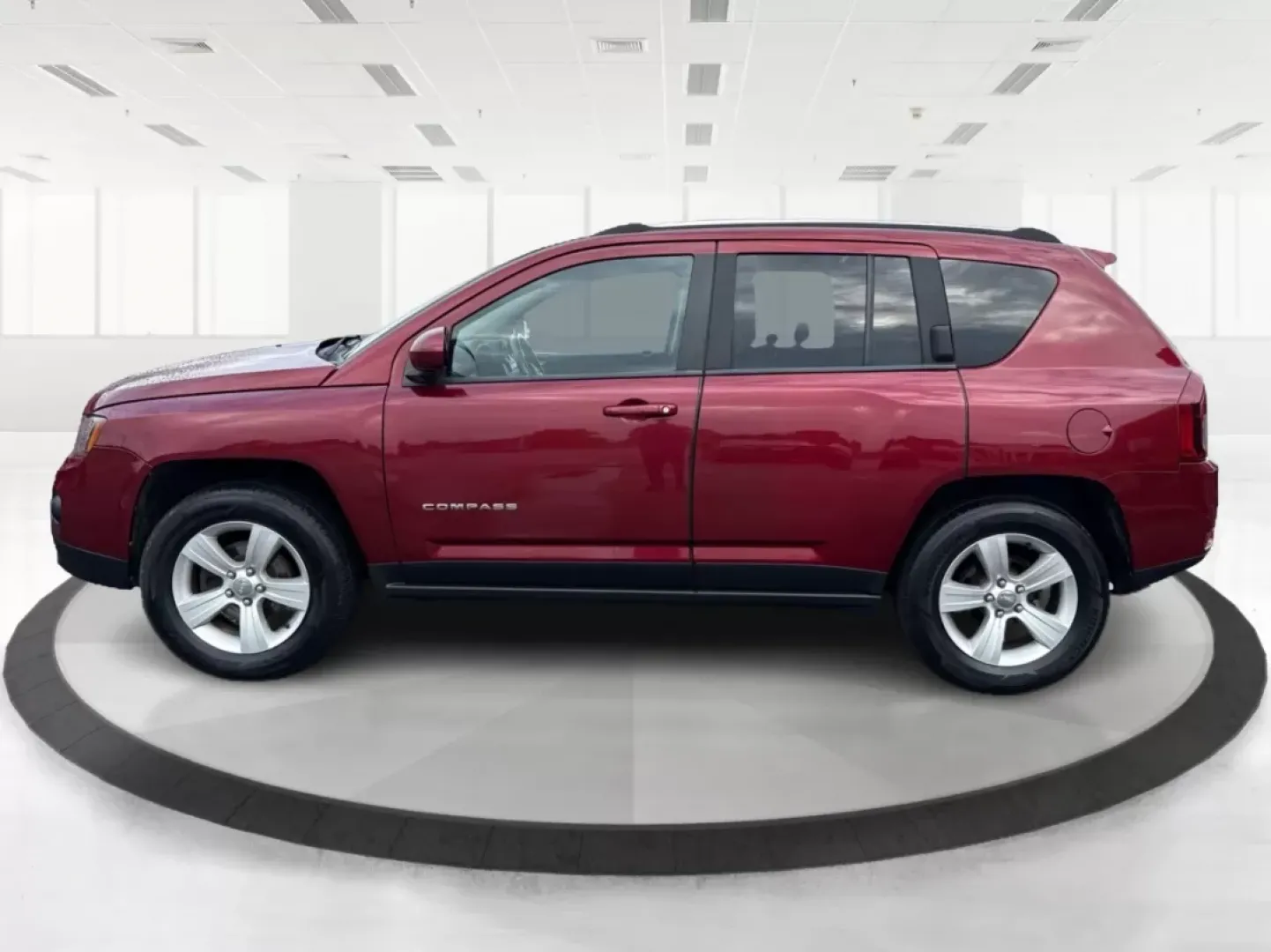 2014 Jeep Compass Latitude (1C4NJDEBXED) with an 2.4L I-4 DOHC engine, located at 8750 N County Rd 25A, Piqua, OH, 45356, (937) 908-9800, 40.164391, -84.232513 - **Discover Your Adventure with the 2014 Jeep Compass Latitude Perfect for Family Road Trips or Daily Commutes!**<br /> <br /> Are you ready to elevate your driving experience? The 2014 Jeep Compass Latitude is not just a vehicle; it's a lifestyle. Whether you're navigating busy city streets in Fair - Photo#5