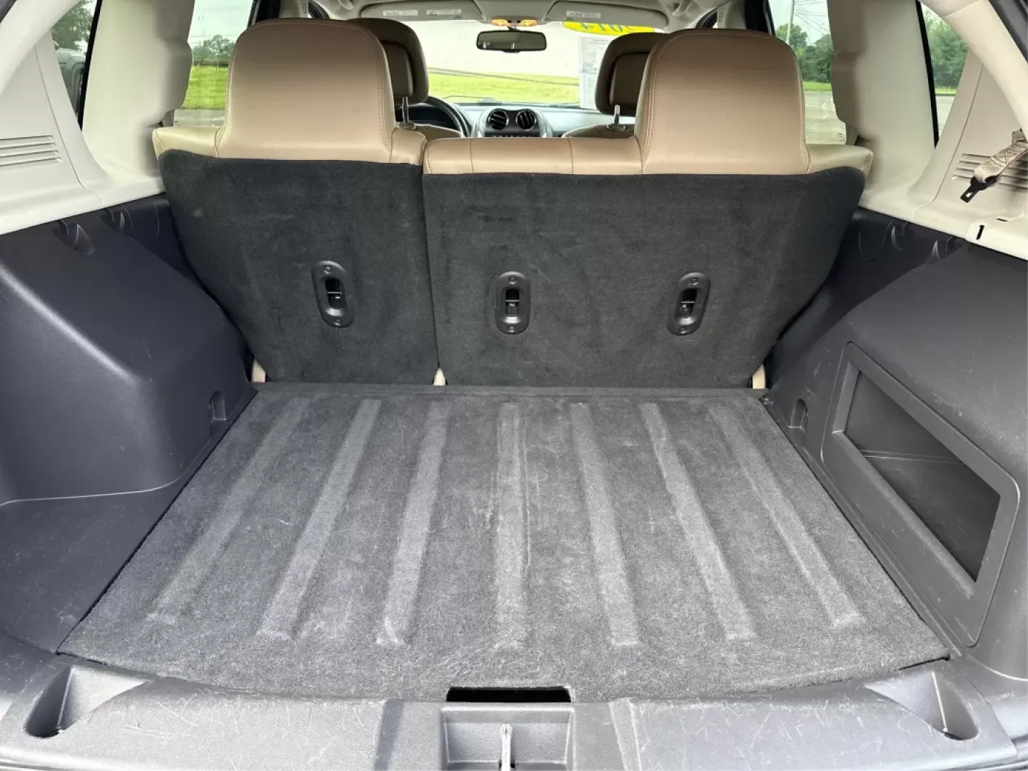 2014 Jeep Compass Latitude (1C4NJDEBXED) with an 2.4L I-4 DOHC engine, located at 8750 N County Rd 25A, Piqua, OH, 45356, (937) 908-9800, 40.164391, -84.232513 - **Discover Your Adventure with the 2014 Jeep Compass Latitude Perfect for Family Road Trips or Daily Commutes!**<br /> <br /> Are you ready to elevate your driving experience? The 2014 Jeep Compass Latitude is not just a vehicle; it's a lifestyle. Whether you're navigating busy city streets in Fair - Photo#12