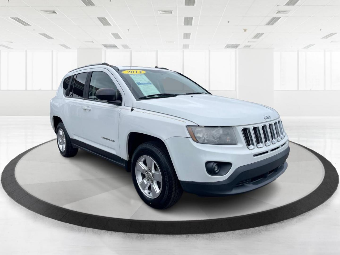 2014 Bright White Clearcoat Jeep Compass Sport FWD (1C4NJCBA9ED) with an 2.0L L4 DOHC 16V engine, located at 8750 N County Rd 25A, Piqua, OH, 45356, (937) 908-9800, 40.164391, -84.232513 - 2014 Jeep Compass Sport FWD - Photo#0