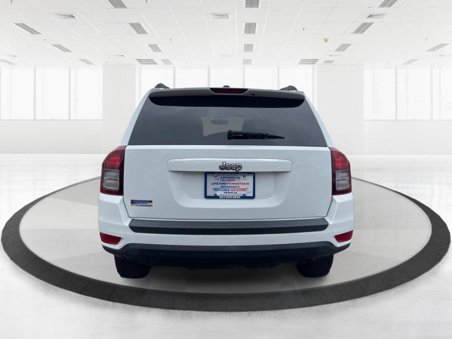 2014 Bright White Clearcoat Jeep Compass Sport FWD (1C4NJCBA9ED) with an 2.0L L4 DOHC 16V engine, located at 8750 N County Rd 25A, Piqua, OH, 45356, (937) 908-9800, 40.164391, -84.232513 - 2014 Jeep Compass Sport FWD - Photo#3