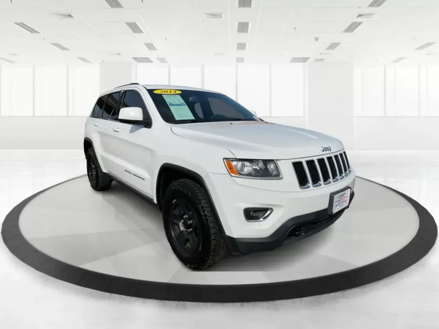 2014 Jeep Grand Cherokee Laredo (1C4RJFAGXEC) with an 3.6L V-6 DOHC engine, located at 1951 S Dayton Lakeview Rd., New Carlisle, OH, 45344, (937) 908-9800, 39.890999, -84.050255 - 2014 Jeep Grand Cherokee Laredo - Photo#0