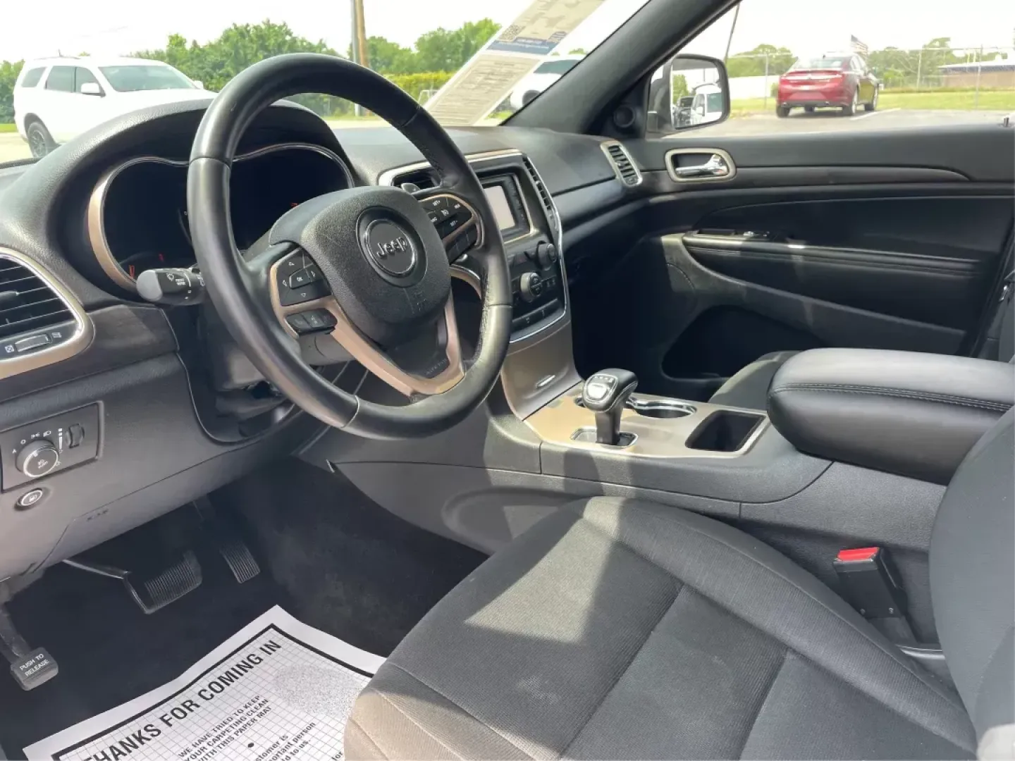 2014 Jeep Grand Cherokee Laredo (1C4RJFAGXEC) with an 3.6L V-6 DOHC engine, located at 1184 Kauffman Ave, Fairborn, OH, 45324, (937) 908-9800, 39.807072, -84.030914 - **Explore the Great Outdoors with the 2014 Jeep Grand Cherokee Laredo Perfect for Adventurous Souls!**<br /> <br /> Are you ready to elevate your travel experience? The 2014 Jeep Grand Cherokee Laredo is not just a vehicle; it's your ticket to adventure. Ideal for families seeking weekend getaways, - Photo#8