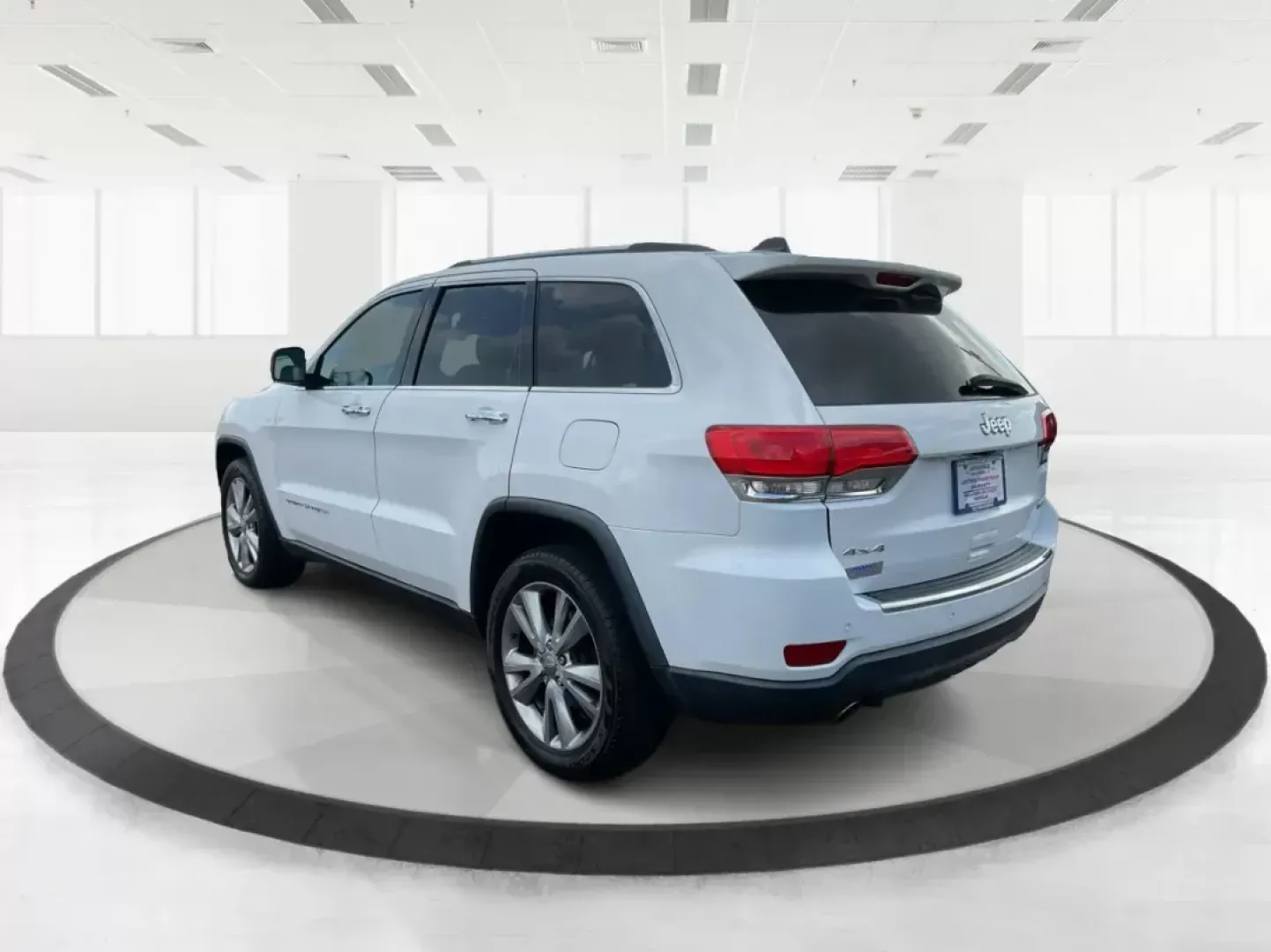 2014 Jeep Grand Cherokee Limited (1C4RJFBGXEC) with an Other engine, located at 1099 N County Rd 25A, Troy, OH, 45373, (937) 908-9800, 40.057079, -84.212883 - **Adventure Awaits with the 2014 Jeep Grand Cherokee Limited Your Ideal SUV for Family Road Trips or Weekend Getaways!**<br /> <br /> Are you searching for a versatile SUV that can handle both daily commutes and adventurous weekends? Look no further! The 2014 Jeep Grand Cherokee Limited, available - Photo#4
