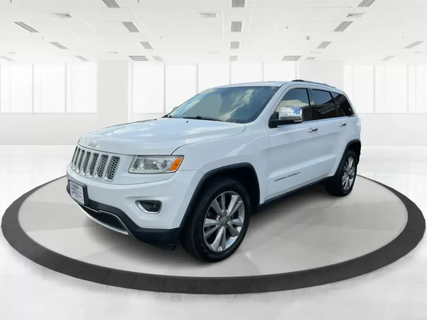 2014 Jeep Grand Cherokee Limited (1C4RJFBGXEC) with an Other engine, located at 1099 N County Rd 25A, Troy, OH, 45373, (937) 908-9800, 40.057079, -84.212883 - **Adventure Awaits with the 2014 Jeep Grand Cherokee Limited Your Ideal SUV for Family Road Trips or Weekend Getaways!**<br /> <br /> Are you searching for a versatile SUV that can handle both daily commutes and adventurous weekends? Look no further! The 2014 Jeep Grand Cherokee Limited, available - Photo#7