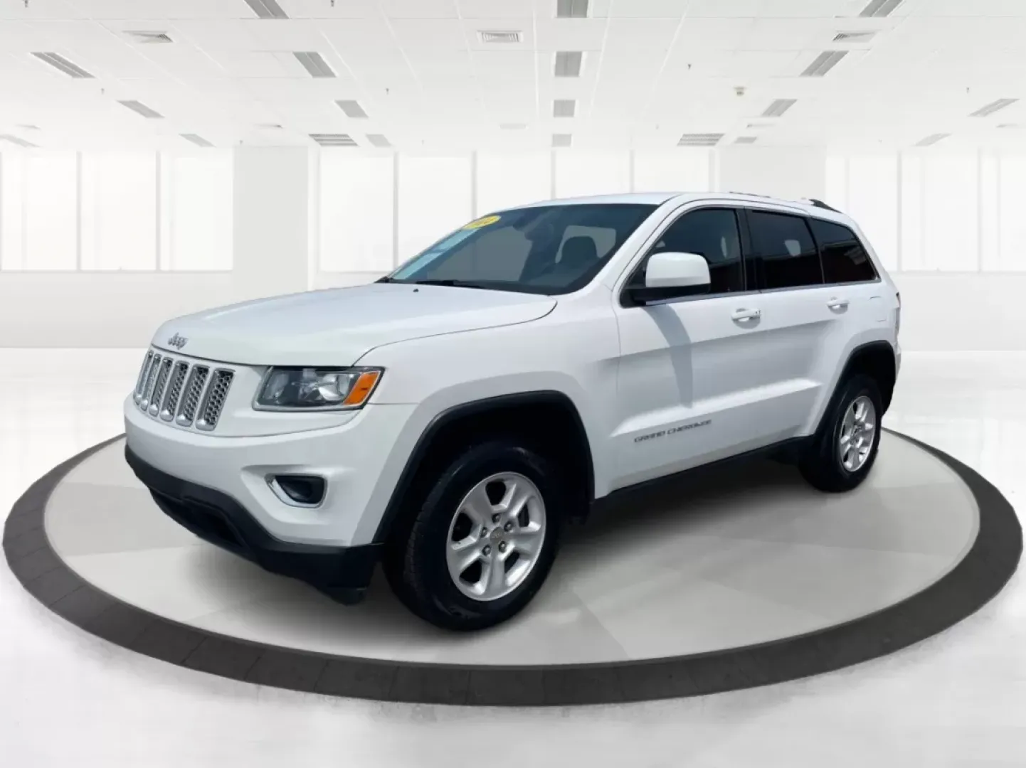 2014 Jeep Grand Cherokee Laredo (1C4RJFAGXEC) with an 3.6L V-6 DOHC engine, located at 1184 Kauffman Ave, Fairborn, OH, 45324, (937) 908-9800, 39.807072, -84.030914 - Are you ready to elevate your daily drive and weekend adventures? Look no further than Advantage Car and Credit in Fairborn, OH, where we specialize in offering reliable vehicles tailored to your lifestyle. Our featured vehicle, a 2014 Jeep Grand Cherokee Laredo, is perfect for anyone seeking a blen - Photo#8