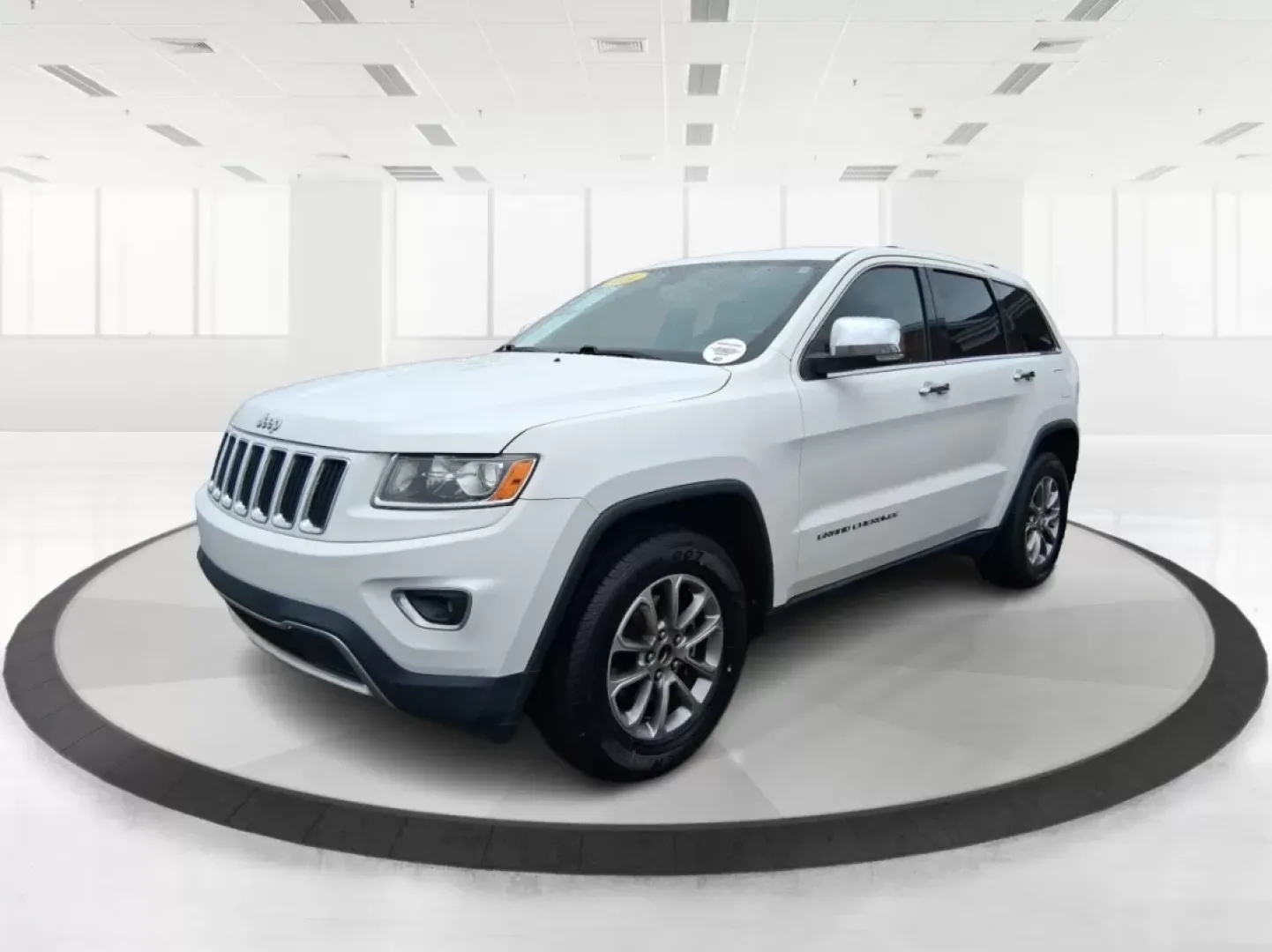 2014 Jeep Grand Cherokee Limited (1C4RJEBG2EC) with an Other engine, located at 8750 N County Rd 25A, Piqua, OH, 45356, (937) 908-9800, 40.164391, -84.232513 - **Unleash Adventure with the 2014 Jeep Grand Cherokee Limited at Advantage Car and Credit - Piqua!**<br /> <br /> Are you ready to elevate your driving experience? The 2014 Jeep Grand Cherokee Limited is the perfect vehicle for those who crave both adventure and comfort. Whether you're taking the fa - Photo#8