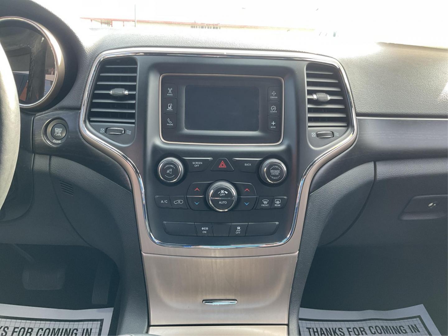 2014 Jeep Grand Cherokee Laredo (1C4RJFAGXEC) with an 3.6L V-6 DOHC engine, located at 1951 S Dayton Lakeview Rd., New Carlisle, OH, 45344, (937) 908-9800, 39.890999, -84.050255 - 2014 Jeep Grand Cherokee Laredo - Photo#12