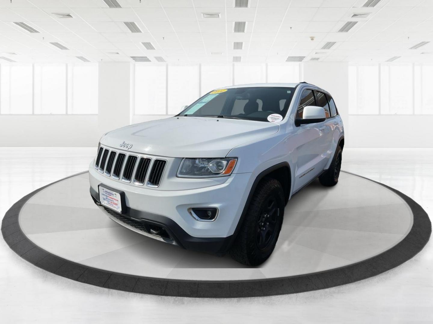 2014 Jeep Grand Cherokee Laredo (1C4RJFAGXEC) with an 3.6L V-6 DOHC engine, located at 1951 S Dayton Lakeview Rd., New Carlisle, OH, 45344, (937) 908-9800, 39.890999, -84.050255 - 2014 Jeep Grand Cherokee Laredo - Photo#7