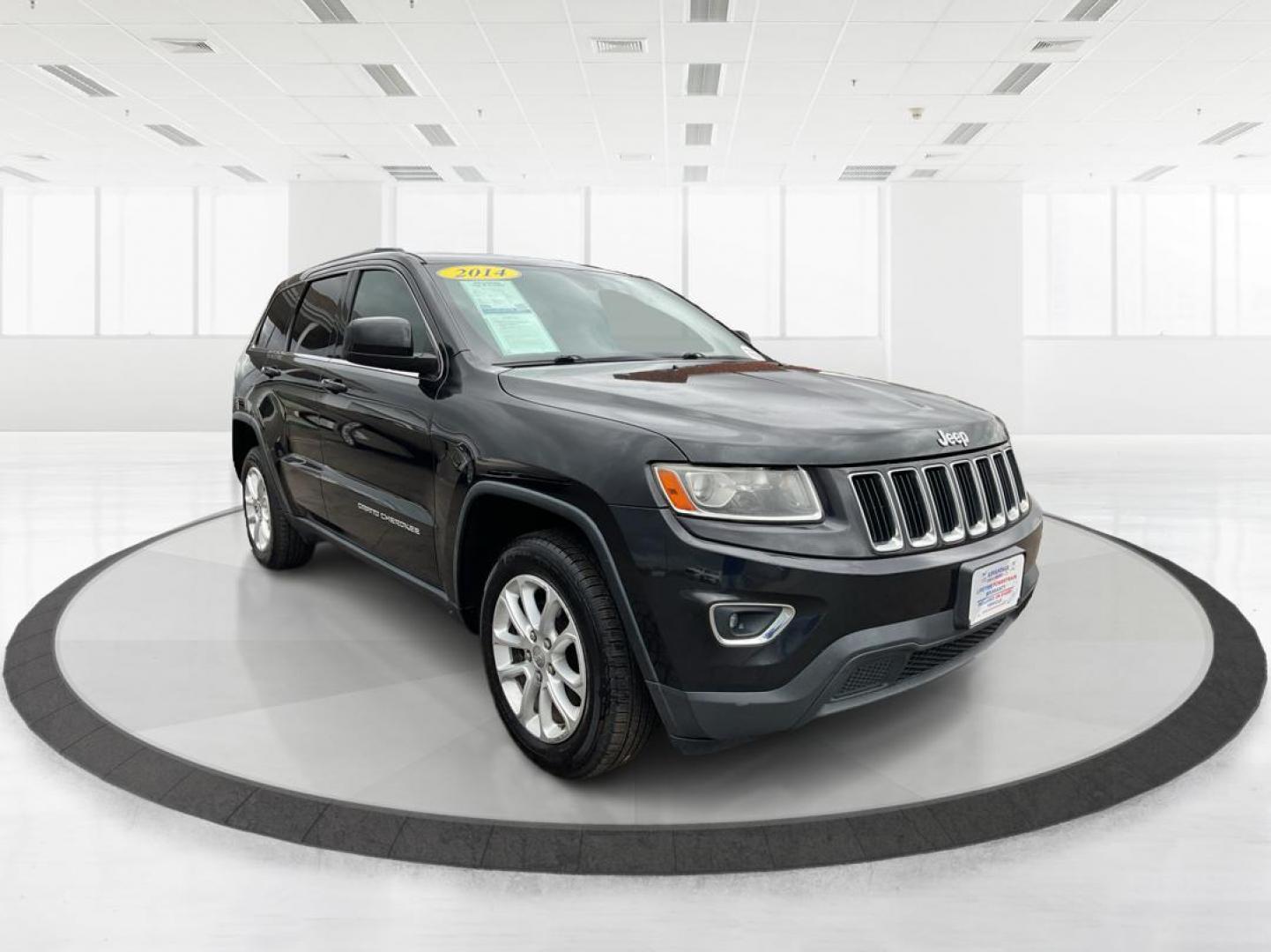 2014 Brilliant Black Crystal P Jeep Grand Cherokee Laredo 4WD (1C4RJFAG5EC) with an 3.6L V6 DOHC 24V engine, 5-Speed Automatic transmission, located at 401 Woodman Dr, Riverside, OH, 45431, (937) 908-9800, 39.760899, -84.123421 - 2014 Jeep Grand Cherokee Laredo 4WD - Photo#0