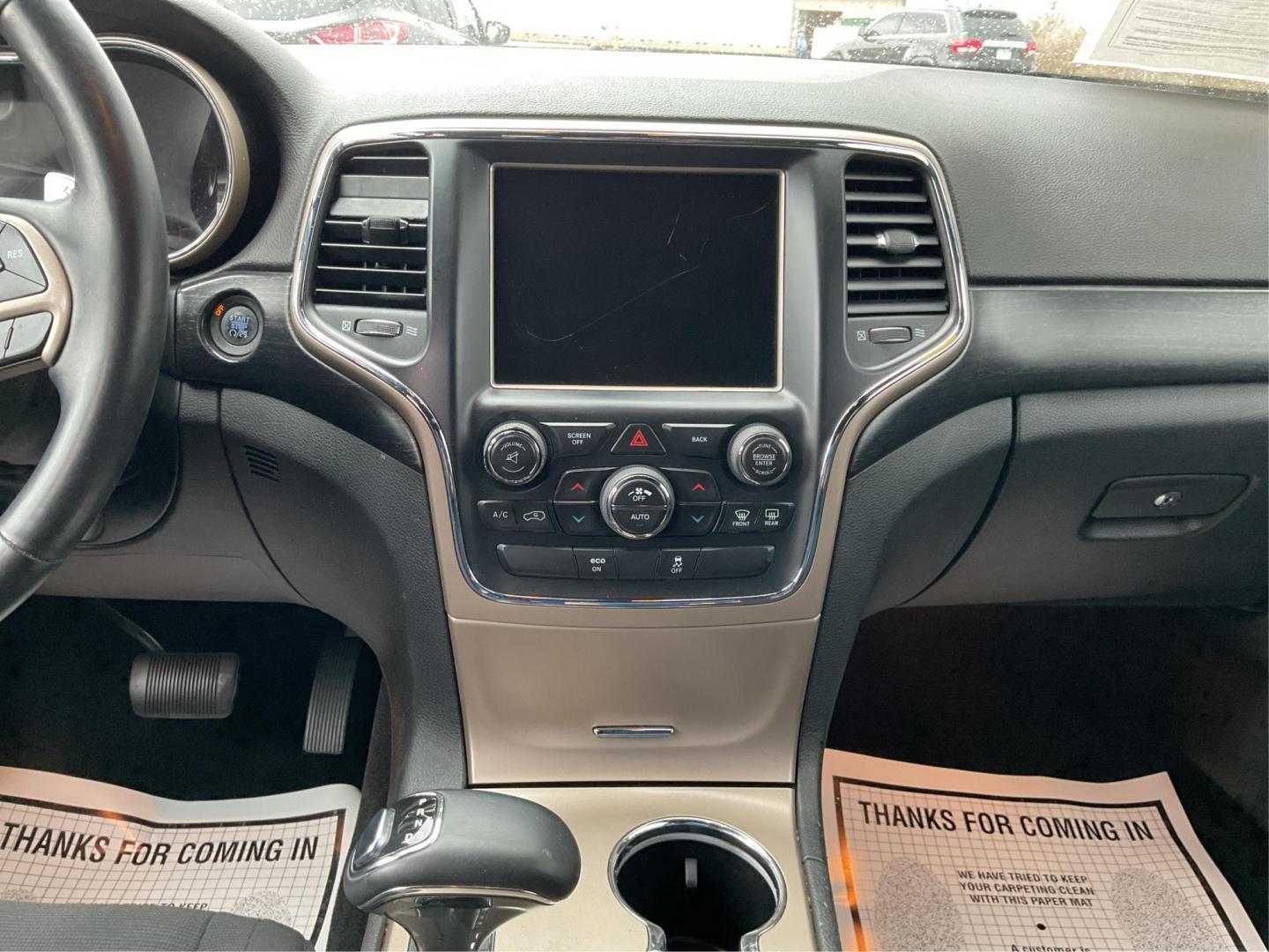 2014 Brilliant Black Crystal P Jeep Grand Cherokee Laredo 4WD (1C4RJFAG5EC) with an 3.6L V6 DOHC 24V engine, 5-Speed Automatic transmission, located at 401 Woodman Dr, Riverside, OH, 45431, (937) 908-9800, 39.760899, -84.123421 - 2014 Jeep Grand Cherokee Laredo 4WD - Photo#11