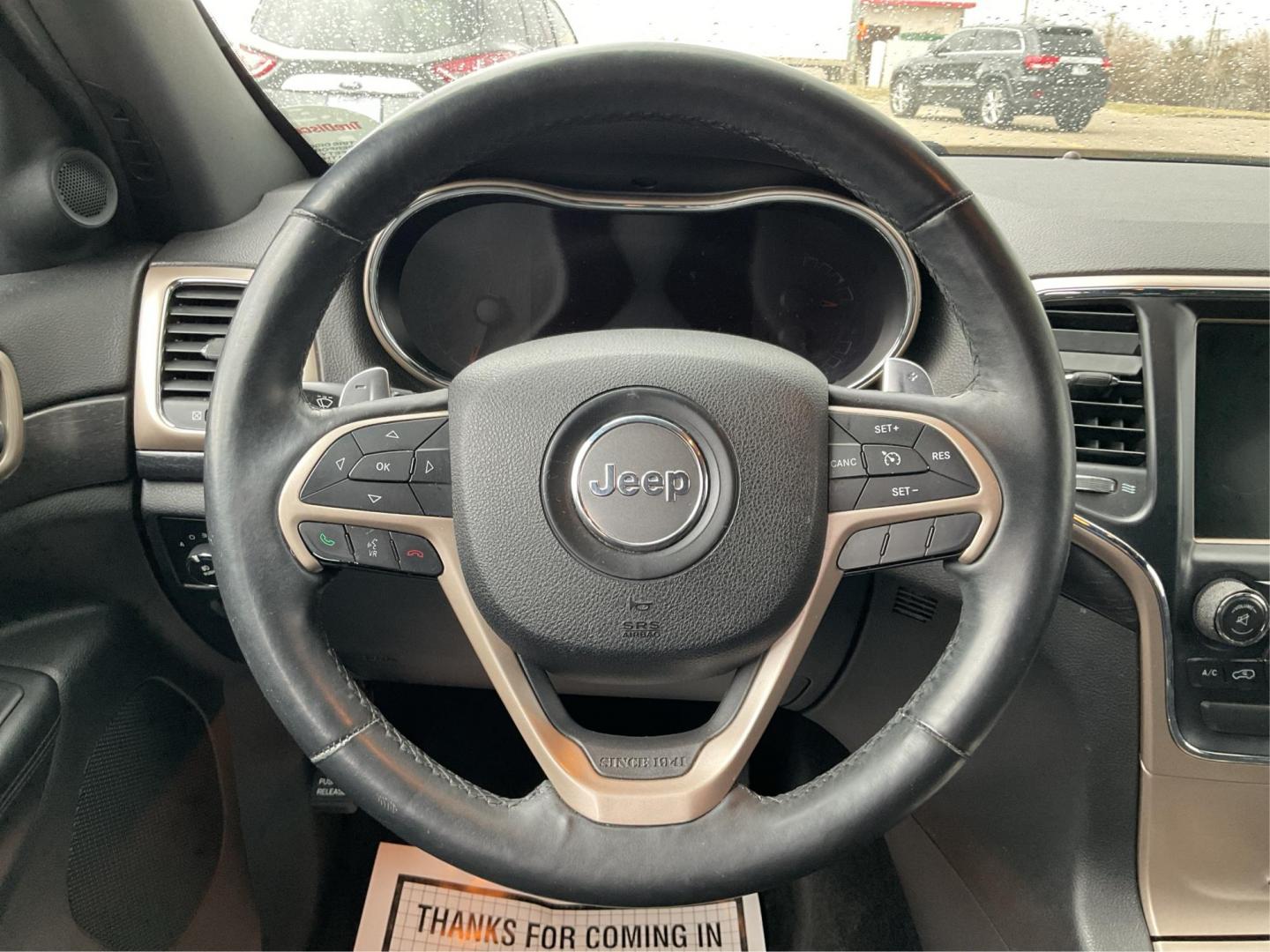2014 Brilliant Black Crystal P Jeep Grand Cherokee Laredo 4WD (1C4RJFAG5EC) with an 3.6L V6 DOHC 24V engine, 5-Speed Automatic transmission, located at 401 Woodman Dr, Riverside, OH, 45431, (937) 908-9800, 39.760899, -84.123421 - 2014 Jeep Grand Cherokee Laredo 4WD - Photo#14
