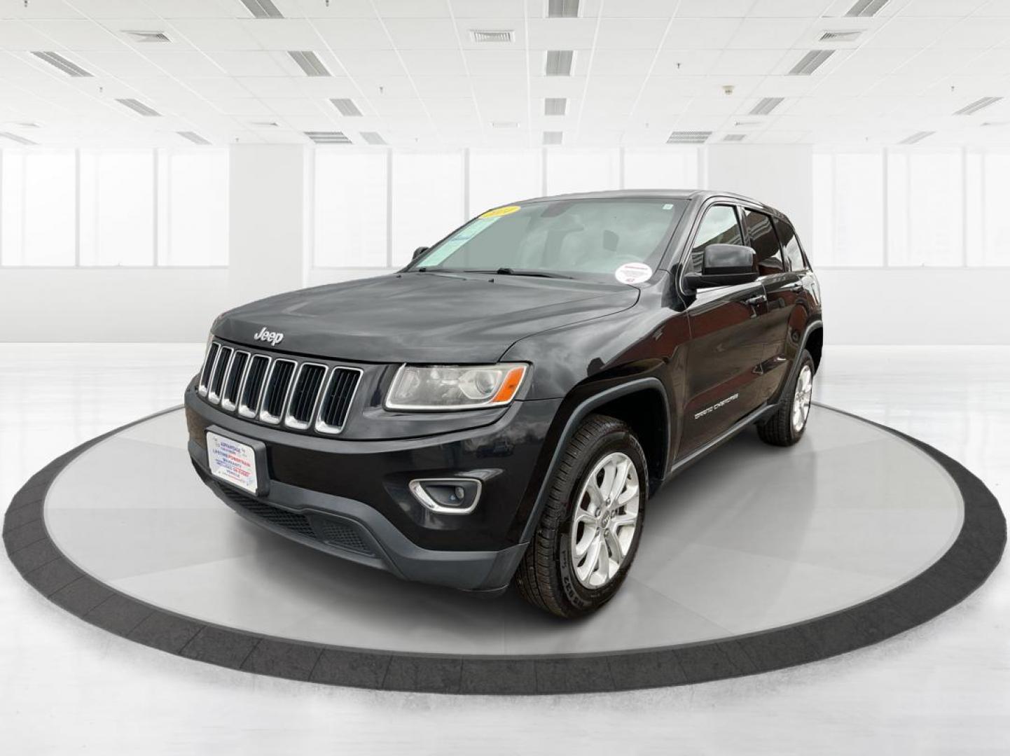 2014 Brilliant Black Crystal P Jeep Grand Cherokee Laredo 4WD (1C4RJFAG5EC) with an 3.6L V6 DOHC 24V engine, 5-Speed Automatic transmission, located at 401 Woodman Dr, Riverside, OH, 45431, (937) 908-9800, 39.760899, -84.123421 - 2014 Jeep Grand Cherokee Laredo 4WD - Photo#6