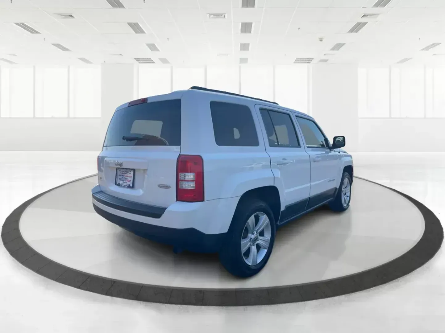 2014 Jeep Patriot Latitude (1C4NJPFB0ED) with an 2.4L I-4 DOHC engine, located at 1951 S Dayton Lakeview Rd., New Carlisle, OH, 45344, (937) 908-9800, 39.890999, -84.050255 - **Adventure Awaits with This 2014 Jeep Patriot Latitude! Perfect for Road Trips and Family Outings!**<br /> <br /> Explore the open road with confidence and comfort in this 2014 Jeep Patriot Latitude, now available at Advantage Car and Credit in Fairborn, OH. This SUV is the ideal companion for grow - Photo#3