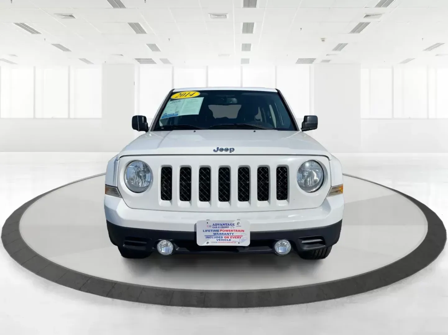 2014 Jeep Patriot Latitude (1C4NJPFB0ED) with an 2.4L I-4 DOHC engine, located at 1951 S Dayton Lakeview Rd., New Carlisle, OH, 45344, (937) 908-9800, 39.890999, -84.050255 - **Adventure Awaits with This 2014 Jeep Patriot Latitude! Perfect for Road Trips and Family Outings!**<br /> <br /> Explore the open road with confidence and comfort in this 2014 Jeep Patriot Latitude, now available at Advantage Car and Credit in Fairborn, OH. This SUV is the ideal companion for grow - Photo#8