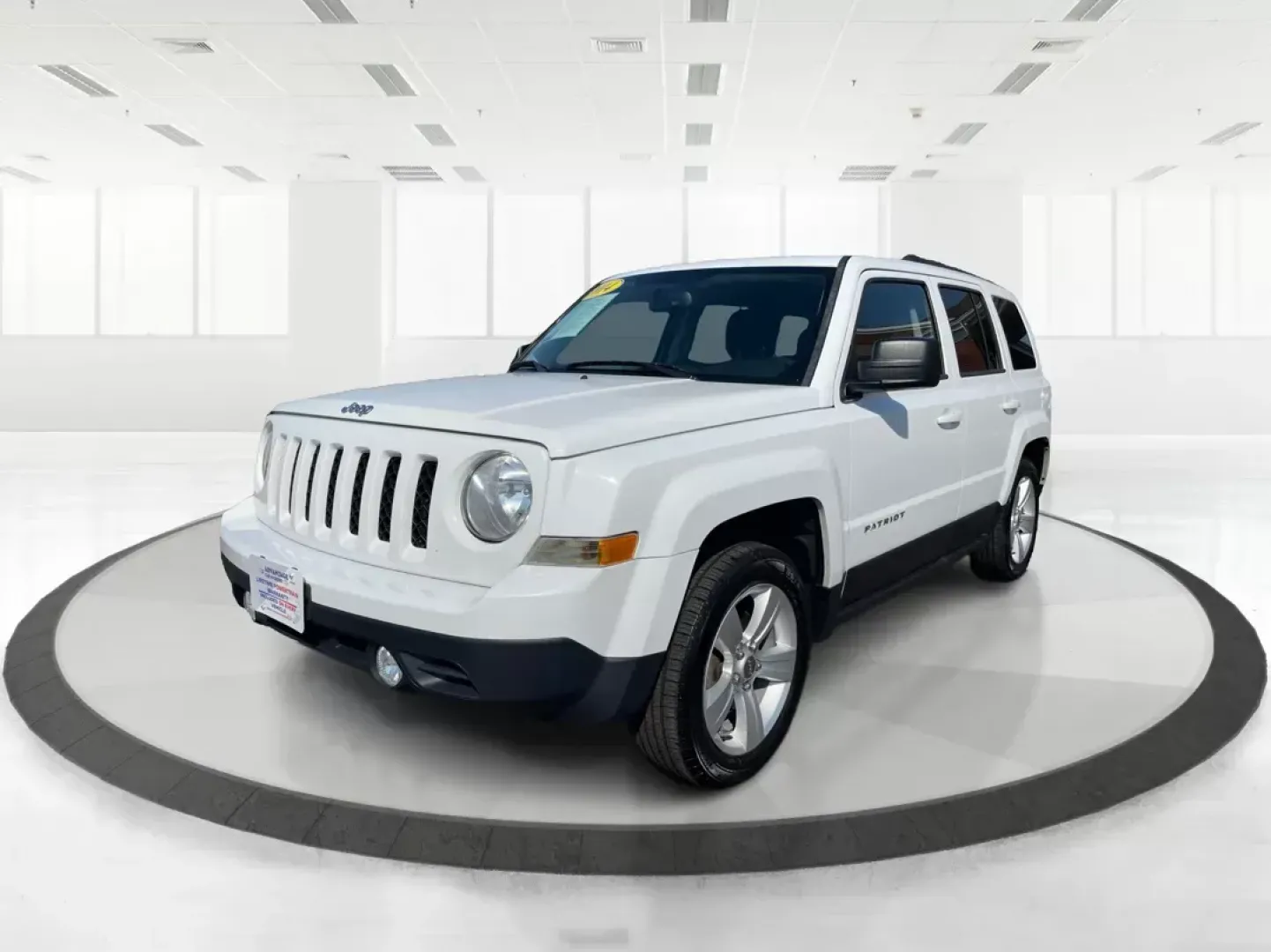 2014 Jeep Patriot Latitude (1C4NJPFB0ED) with an 2.4L I-4 DOHC engine, located at 1951 S Dayton Lakeview Rd., New Carlisle, OH, 45344, (937) 908-9800, 39.890999, -84.050255 - **Adventure Awaits with This 2014 Jeep Patriot Latitude! Perfect for Road Trips and Family Outings!**<br /> <br /> Explore the open road with confidence and comfort in this 2014 Jeep Patriot Latitude, now available at Advantage Car and Credit in Fairborn, OH. This SUV is the ideal companion for grow - Photo#9