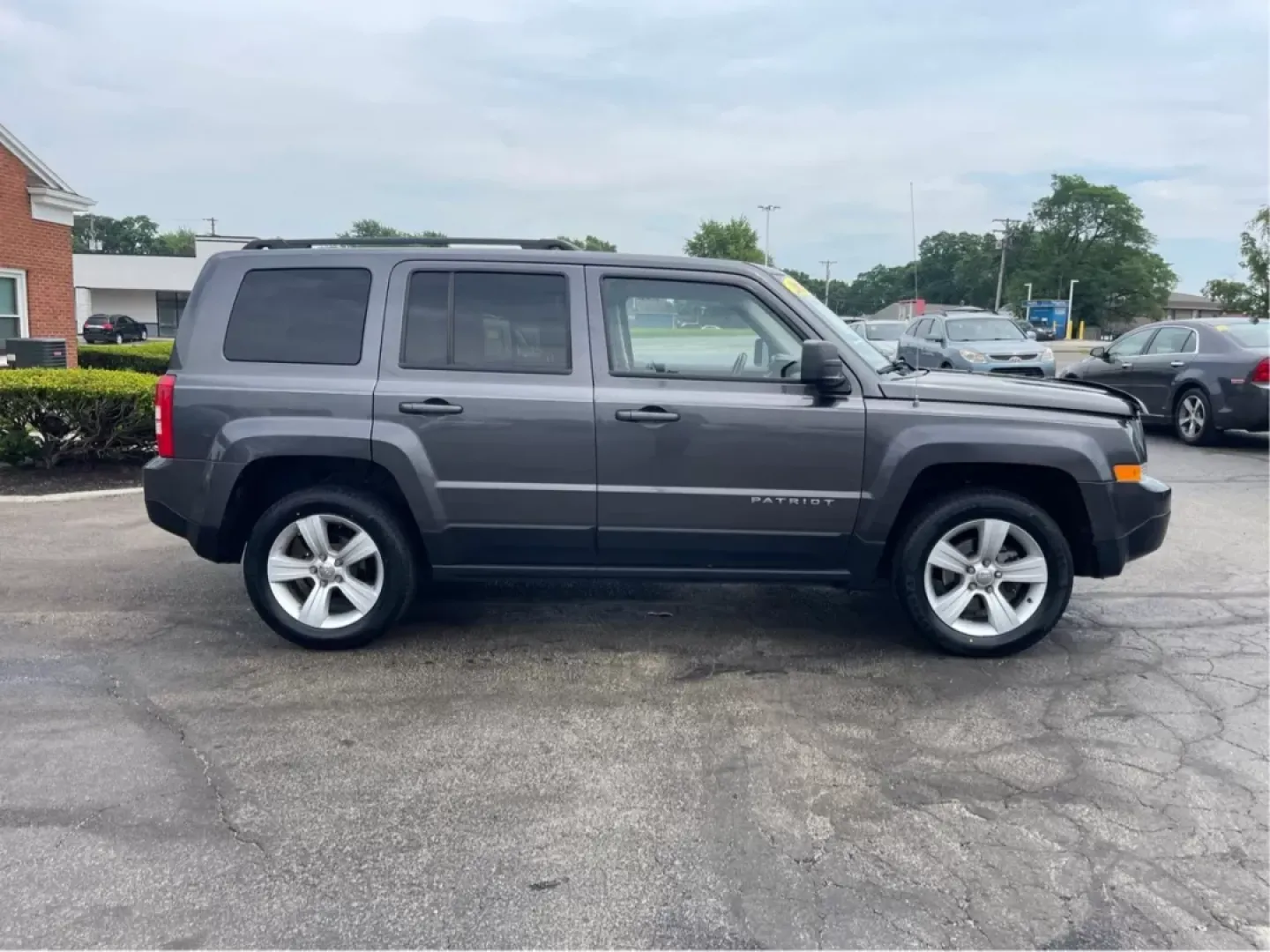 2014 Jeep Patriot Latitude 4WD (1C4NJRFB5ED) with an 2.4L L4 DOHC 16V engine, located at 1230 East Main St, Xenia, OH, 45385, (937) 908-9800, 39.688026, -83.910172 - **Adventure Awaits with the 2014 Jeep Patriot Latitude 4WD!**<br /> <br /> If you're longing for a vehicle that blends rugged capability with everyday comfort, look no further than the 2014 Jeep Patriot Latitude 4WD. Perfect for weekend adventures or daily commutes, this SUV is designed to take you - Photo#1