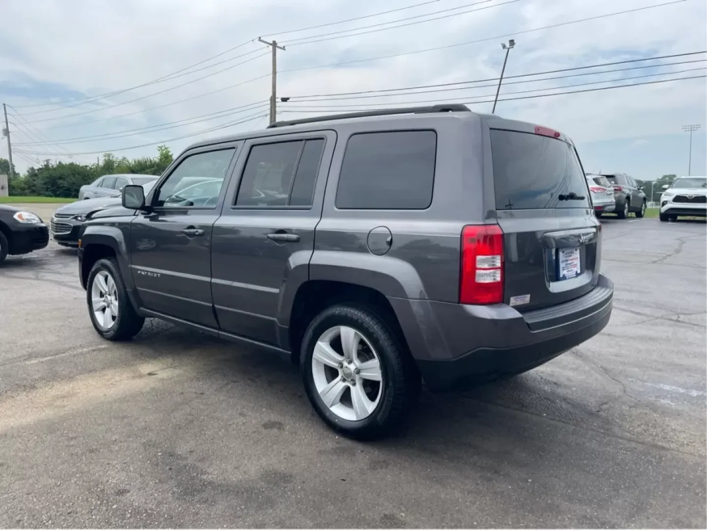 2014 Jeep Patriot Latitude 4WD (1C4NJRFB5ED) with an 2.4L L4 DOHC 16V engine, located at 1230 East Main St, Xenia, OH, 45385, (937) 908-9800, 39.688026, -83.910172 - **Adventure Awaits with the 2014 Jeep Patriot Latitude 4WD!**<br /> <br /> If you're longing for a vehicle that blends rugged capability with everyday comfort, look no further than the 2014 Jeep Patriot Latitude 4WD. Perfect for weekend adventures or daily commutes, this SUV is designed to take you - Photo#4