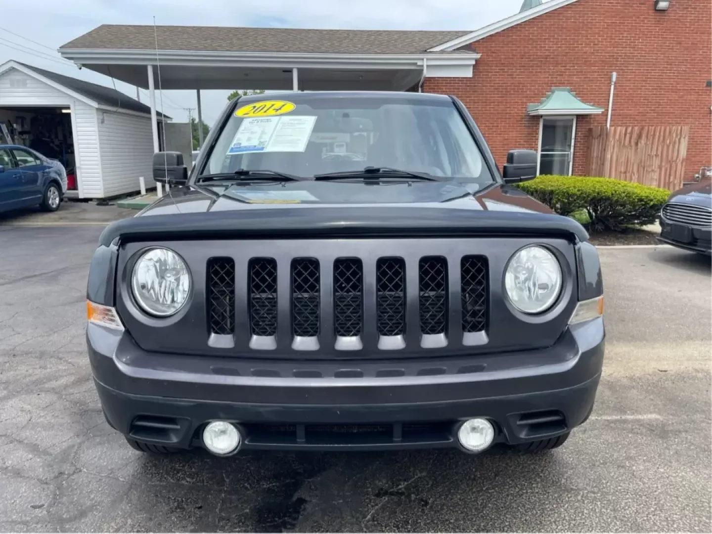 2014 Jeep Patriot Latitude 4WD (1C4NJRFB5ED) with an 2.4L L4 DOHC 16V engine, located at 1230 East Main St, Xenia, OH, 45385, (937) 908-9800, 39.688026, -83.910172 - **Adventure Awaits with the 2014 Jeep Patriot Latitude 4WD!**<br /> <br /> If you're longing for a vehicle that blends rugged capability with everyday comfort, look no further than the 2014 Jeep Patriot Latitude 4WD. Perfect for weekend adventures or daily commutes, this SUV is designed to take you - Photo#6