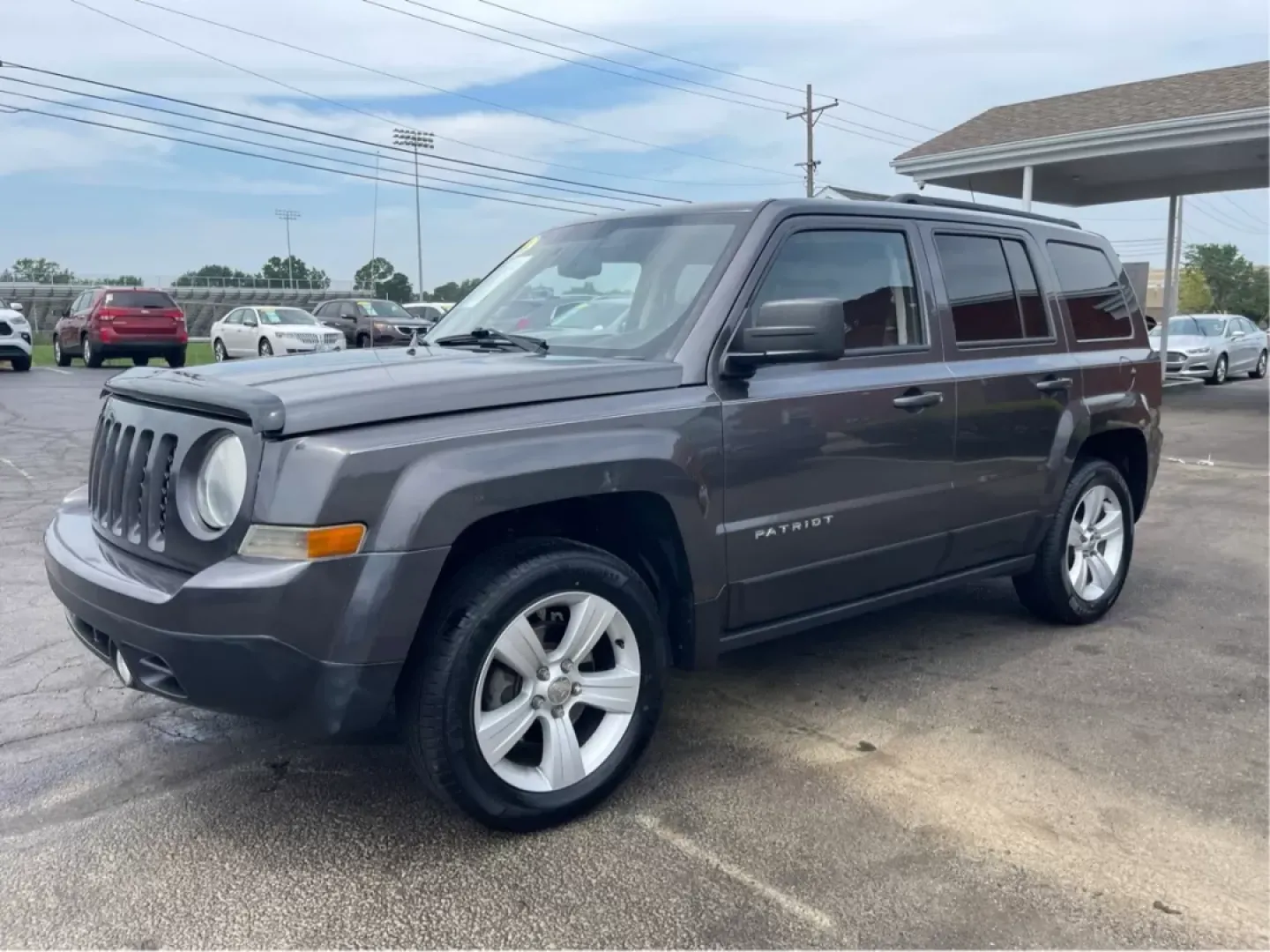 2014 Jeep Patriot Latitude 4WD (1C4NJRFB5ED) with an 2.4L L4 DOHC 16V engine, located at 1230 East Main St, Xenia, OH, 45385, (937) 908-9800, 39.688026, -83.910172 - **Adventure Awaits with the 2014 Jeep Patriot Latitude 4WD!**<br /> <br /> If you're longing for a vehicle that blends rugged capability with everyday comfort, look no further than the 2014 Jeep Patriot Latitude 4WD. Perfect for weekend adventures or daily commutes, this SUV is designed to take you - Photo#7
