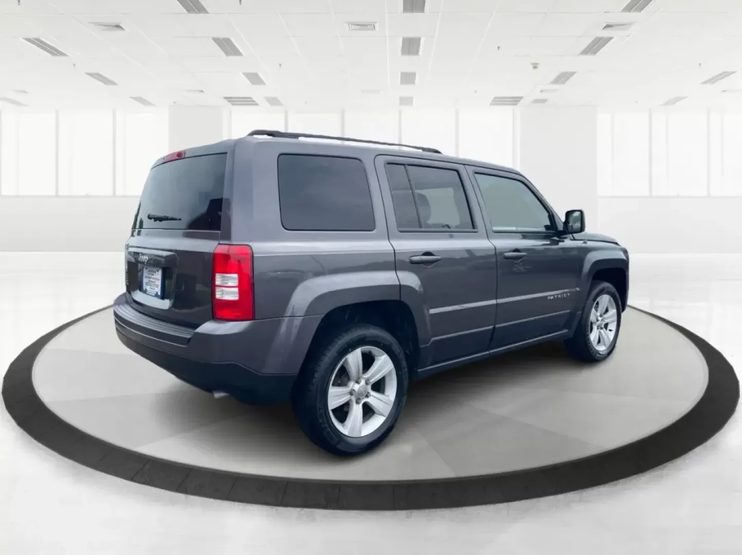 2014 Jeep Patriot Latitude 4WD (1C4NJRFB5ED) with an 2.4L L4 DOHC 16V engine, located at 1230 East Main St, Xenia, OH, 45385, (937) 908-9800, 39.688026, -83.910172 - **Adventure Awaits with the 2014 Jeep Patriot Latitude 4WD!**<br /> <br /> If you're longing for a vehicle that blends rugged capability with everyday comfort, look no further than the 2014 Jeep Patriot Latitude 4WD. Perfect for weekend adventures or daily commutes, this SUV is designed to take you - Photo#16