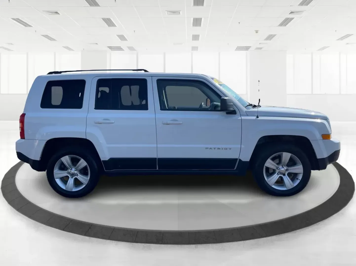 2014 Jeep Patriot Latitude (1C4NJPFB0ED) with an 2.4L I-4 DOHC engine, located at 1951 S Dayton Lakeview Rd., New Carlisle, OH, 45344, (937) 908-9800, 39.890999, -84.050255 - **Adventure Awaits with This 2014 Jeep Patriot Latitude! Perfect for Road Trips and Family Outings!**<br /> <br /> Explore the open road with confidence and comfort in this 2014 Jeep Patriot Latitude, now available at Advantage Car and Credit in Fairborn, OH. This SUV is the ideal companion for grow - Photo#1