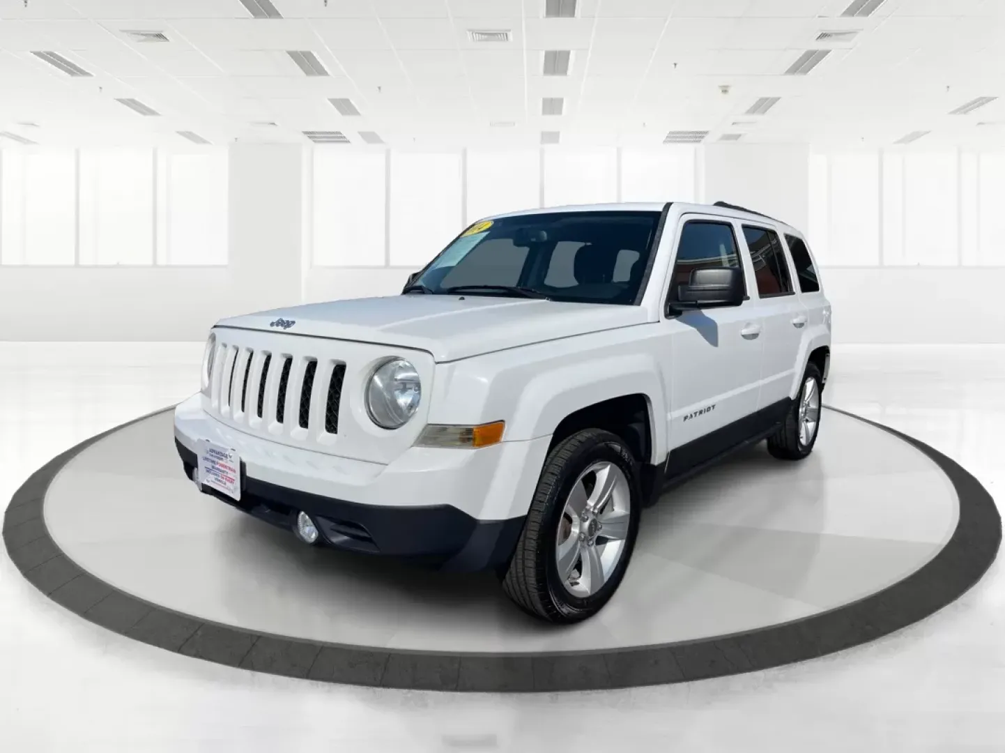2014 Jeep Patriot Latitude (1C4NJPFB0ED) with an 2.4L I-4 DOHC engine, located at 1951 S Dayton Lakeview Rd., New Carlisle, OH, 45344, (937) 908-9800, 39.890999, -84.050255 - **Adventure Awaits with This 2014 Jeep Patriot Latitude! Perfect for Road Trips and Family Outings!**<br /> <br /> Explore the open road with confidence and comfort in this 2014 Jeep Patriot Latitude, now available at Advantage Car and Credit in Fairborn, OH. This SUV is the ideal companion for grow - Photo#8