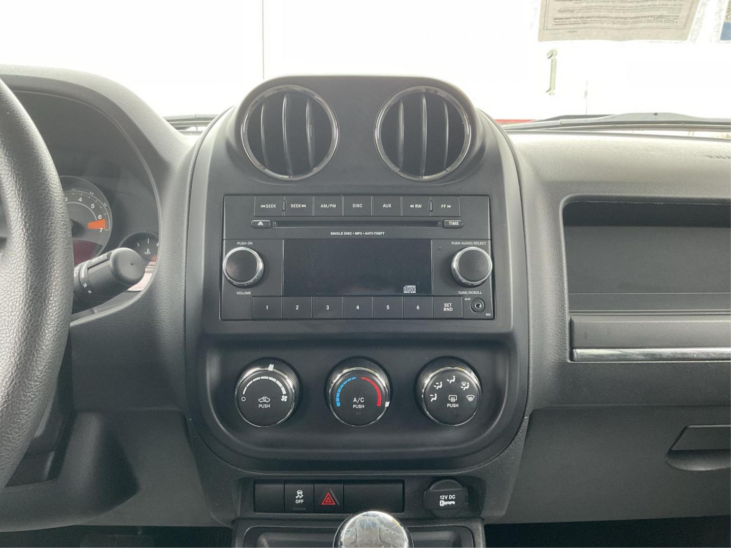2014 Jeep Patriot Sport (1C4NJRBB0ED) with an Other engine, located at 1099 N County Rd 25A, Troy, OH, 45373, (937) 908-9800, 40.057079, -84.212883 - 2014 Jeep Patriot Sport - Photo#12