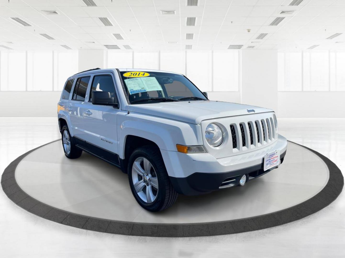 2014 Jeep Patriot Latitude (1C4NJPFB0ED) with an 2.4L I-4 DOHC engine, located at 1099 N County Rd 25A, Troy, OH, 45373, (937) 908-9800, 40.057079, -84.212883 - 2014 Jeep Patriot Latitude - Photo#0