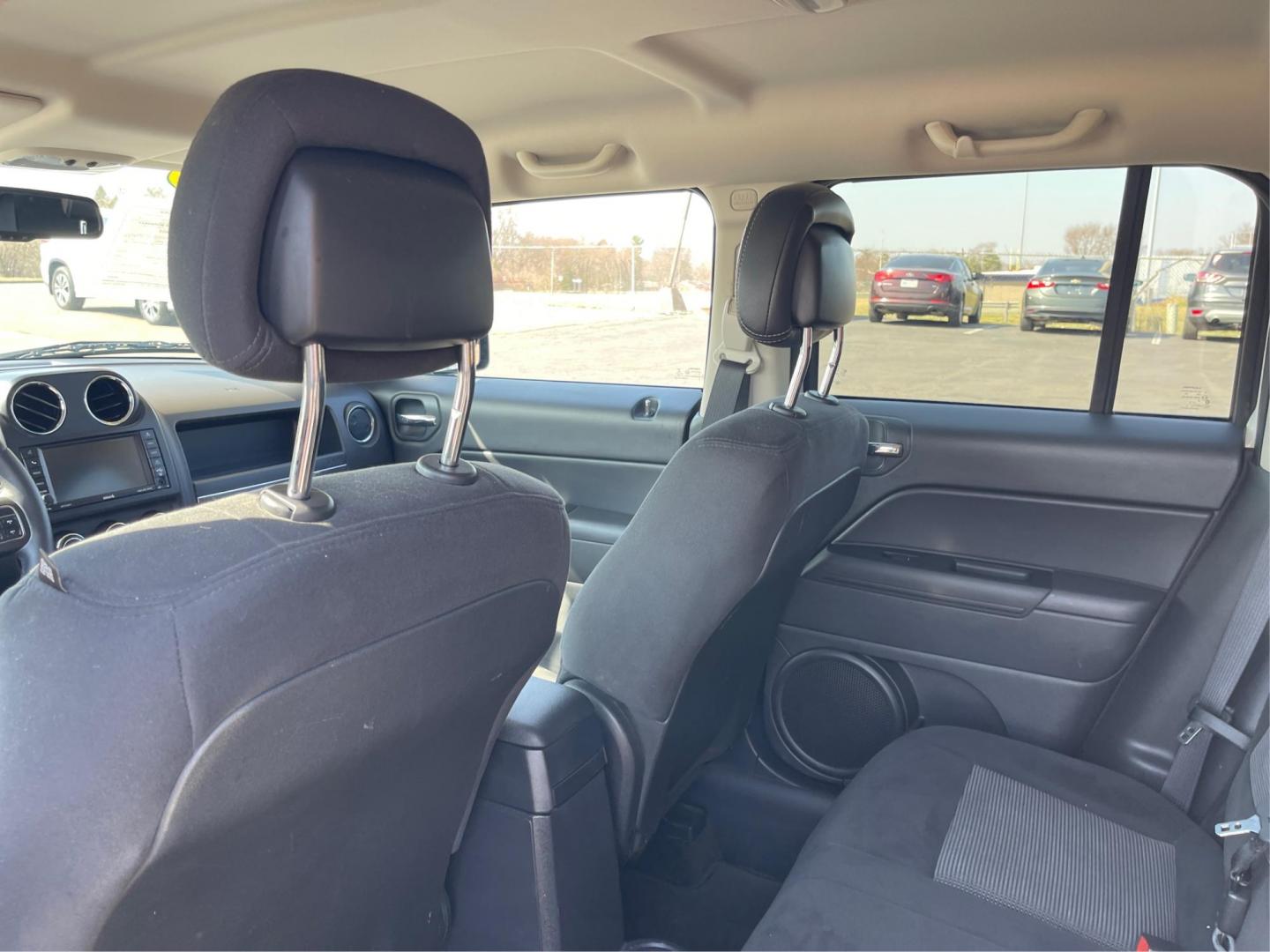 2014 Jeep Patriot Latitude (1C4NJPFB0ED) with an 2.4L I-4 DOHC engine, located at 1099 N County Rd 25A, Troy, OH, 45373, (937) 908-9800, 40.057079, -84.212883 - 2014 Jeep Patriot Latitude - Photo#9