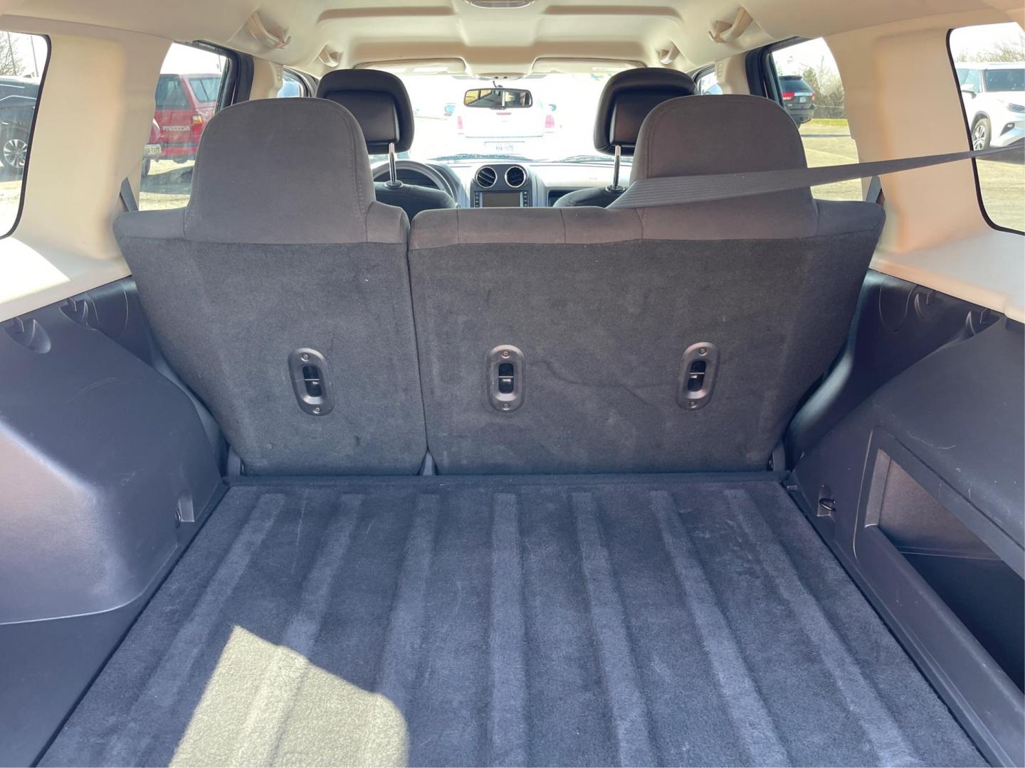 2014 Jeep Patriot Latitude (1C4NJPFB0ED) with an 2.4L I-4 DOHC engine, located at 1099 N County Rd 25A, Troy, OH, 45373, (937) 908-9800, 40.057079, -84.212883 - 2014 Jeep Patriot Latitude - Photo#11