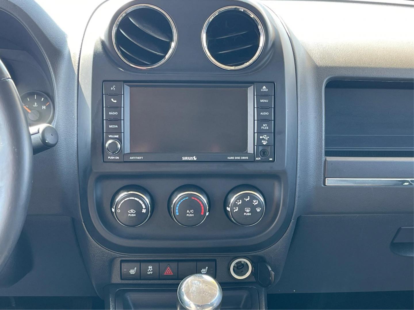 2014 Jeep Patriot Latitude (1C4NJPFB0ED) with an 2.4L I-4 DOHC engine, located at 1099 N County Rd 25A, Troy, OH, 45373, (937) 908-9800, 40.057079, -84.212883 - 2014 Jeep Patriot Latitude - Photo#12