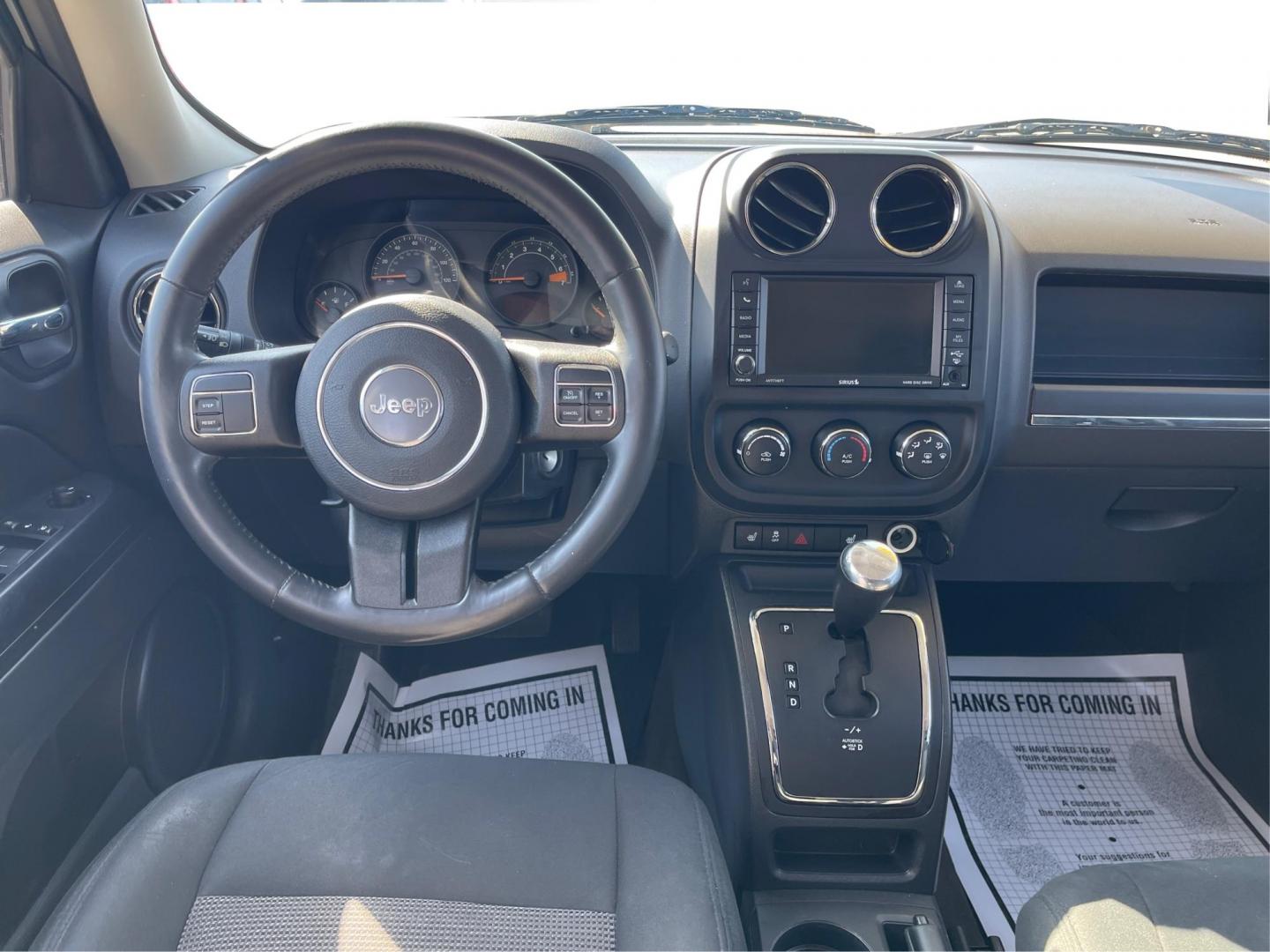 2014 Jeep Patriot Latitude (1C4NJPFB0ED) with an 2.4L I-4 DOHC engine, located at 1099 N County Rd 25A, Troy, OH, 45373, (937) 908-9800, 40.057079, -84.212883 - 2014 Jeep Patriot Latitude - Photo#19