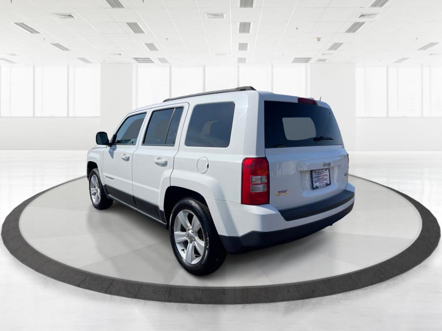 2014 Jeep Patriot Latitude (1C4NJPFB0ED) with an 2.4L I-4 DOHC engine, located at 1099 N County Rd 25A, Troy, OH, 45373, (937) 908-9800, 40.057079, -84.212883 - 2014 Jeep Patriot Latitude - Photo#4