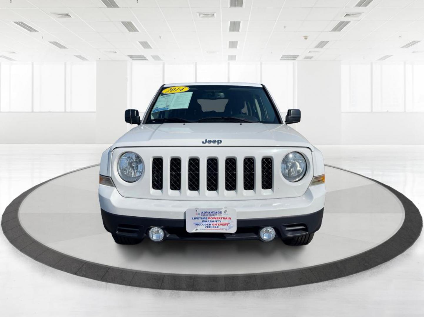 2014 Jeep Patriot Latitude (1C4NJPFB0ED) with an 2.4L I-4 DOHC engine, located at 1099 N County Rd 25A, Troy, OH, 45373, (937) 908-9800, 40.057079, -84.212883 - 2014 Jeep Patriot Latitude - Photo#6
