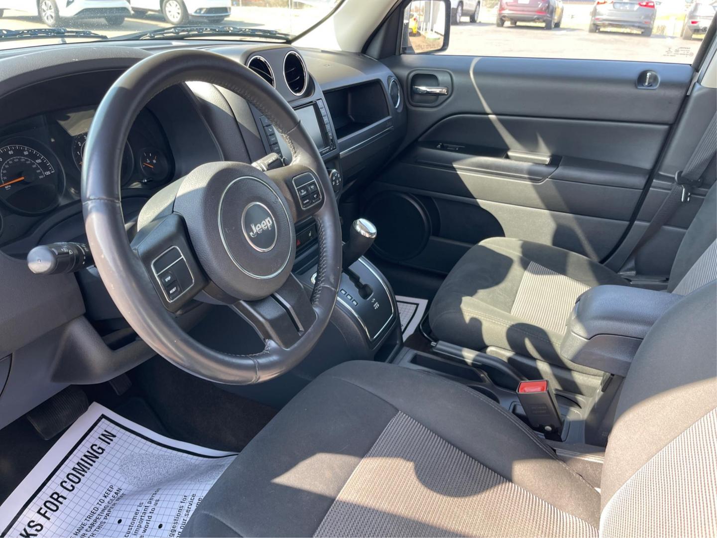2014 Jeep Patriot Latitude (1C4NJPFB0ED) with an 2.4L I-4 DOHC engine, located at 1099 N County Rd 25A, Troy, OH, 45373, (937) 908-9800, 40.057079, -84.212883 - 2014 Jeep Patriot Latitude - Photo#8