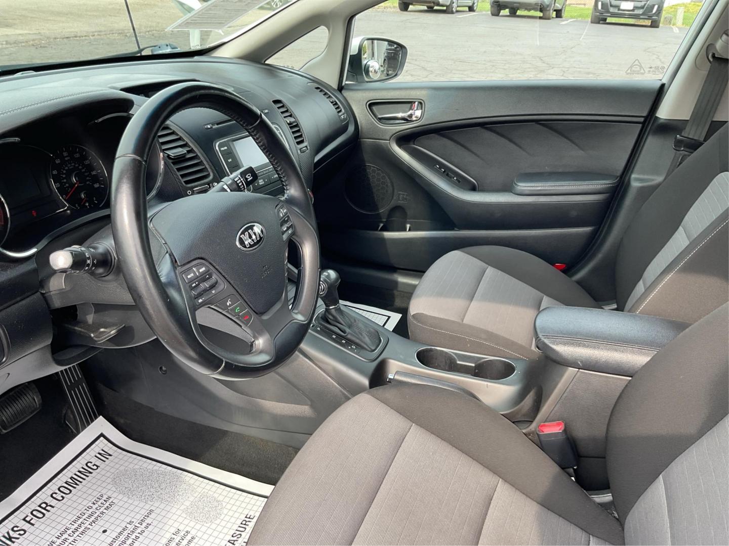 2014 Kia Forte EX (KNAFX4A81E5) with an 2L I-4 gasoline direct injection engine, located at 1099 N County Rd 25A, Troy, OH, 45373, (937) 908-9800, 40.057079, -84.212883 - 2014 Kia Forte EX - Photo#9
