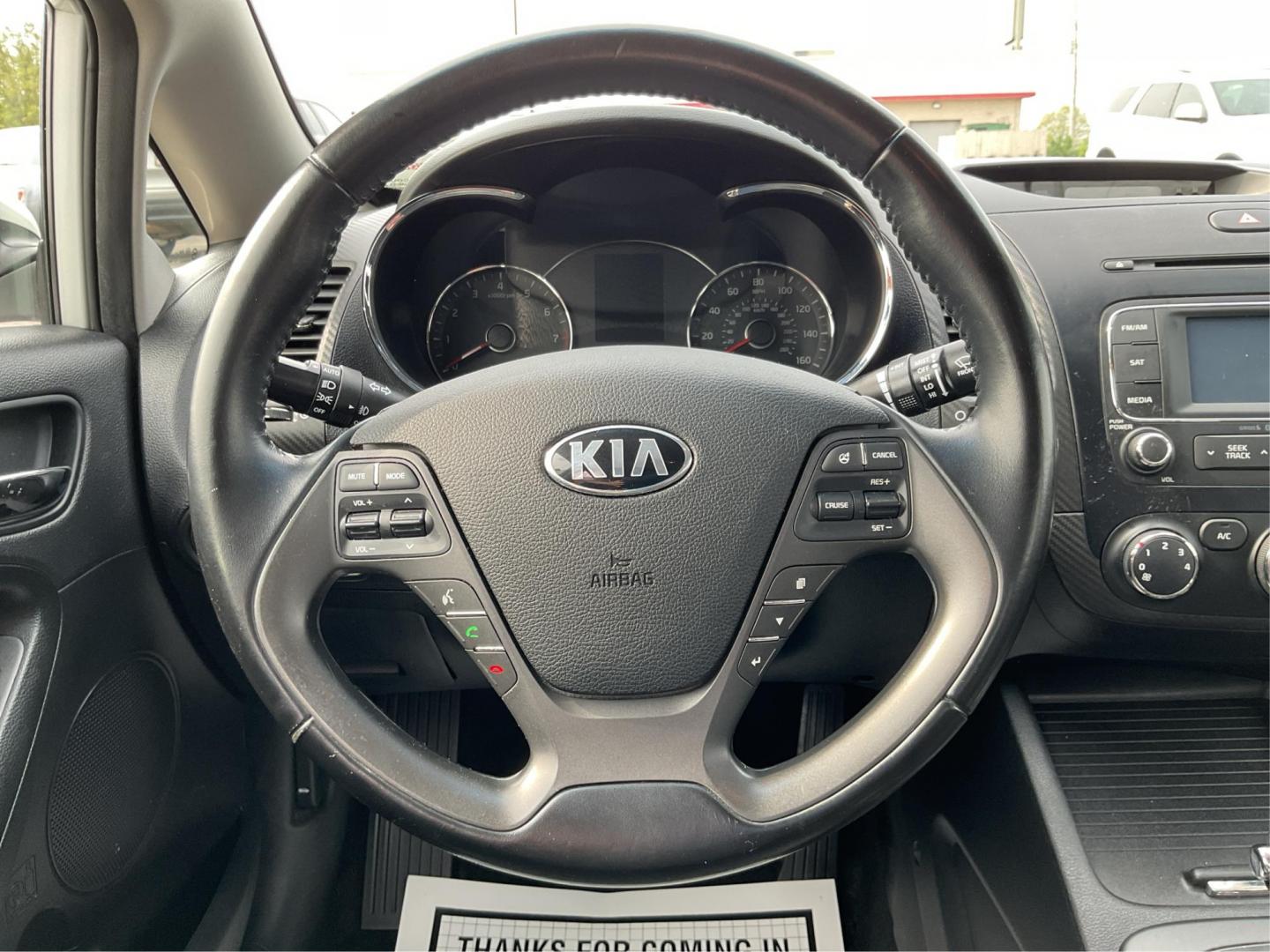 2014 Kia Forte EX (KNAFX4A81E5) with an 2L I-4 gasoline direct injection engine, located at 1099 N County Rd 25A, Troy, OH, 45373, (937) 908-9800, 40.057079, -84.212883 - 2014 Kia Forte EX - Photo#16