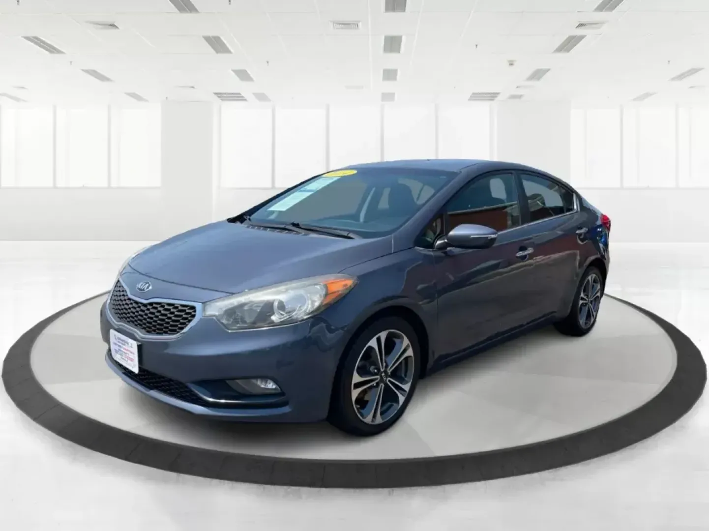 2014 Kia Forte EX (KNAFX4A88E5) with an 2L I-4 gasoline direct injection engine, located at 8750 N County Rd 25A, Piqua, OH, 45356, (937) 908-9800, 40.164391, -84.232513 - **Elevate Your Everyday Commute with the 2014 Kia Forte EX Perfect for the Modern Lifestyle**<br /> <br /> Looking for a reliable vehicle that effortlessly combines style, comfort, and affordability? The 2014 Kia Forte EX is the perfect choice for budget-conscious buyers and growing families alike. - Photo#7