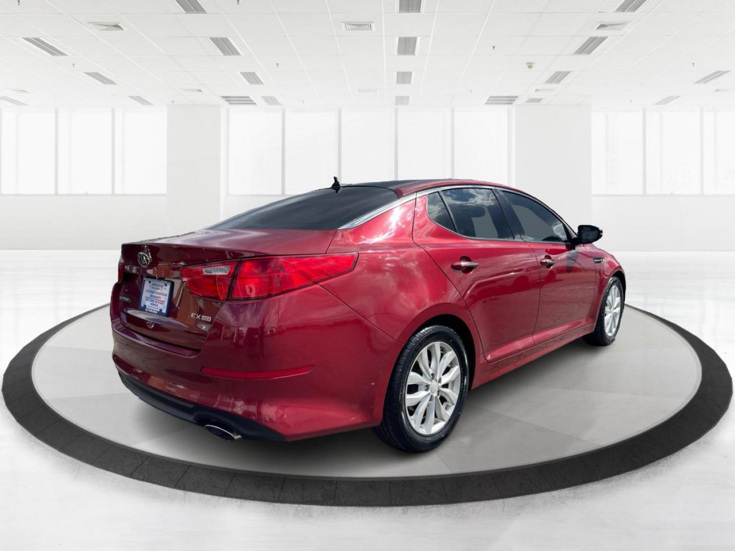 2014 Kia Optima EX (5XXGN4A70EG) with an Theta II 2.4L I-4 gasoline direct injection engine, located at 1184 Kauffman Ave, Fairborn, OH, 45324, (937) 908-9800, 39.807072, -84.030914 - 2014 Kia Optima EX - Photo#2