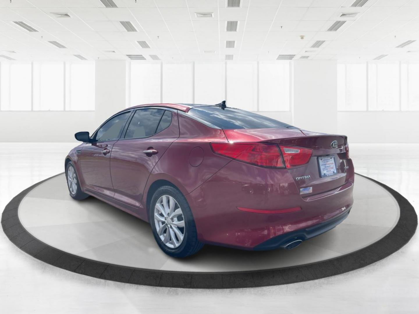 2014 Kia Optima EX (5XXGN4A70EG) with an Theta II 2.4L I-4 gasoline direct injection engine, located at 1184 Kauffman Ave, Fairborn, OH, 45324, (937) 908-9800, 39.807072, -84.030914 - 2014 Kia Optima EX - Photo#4