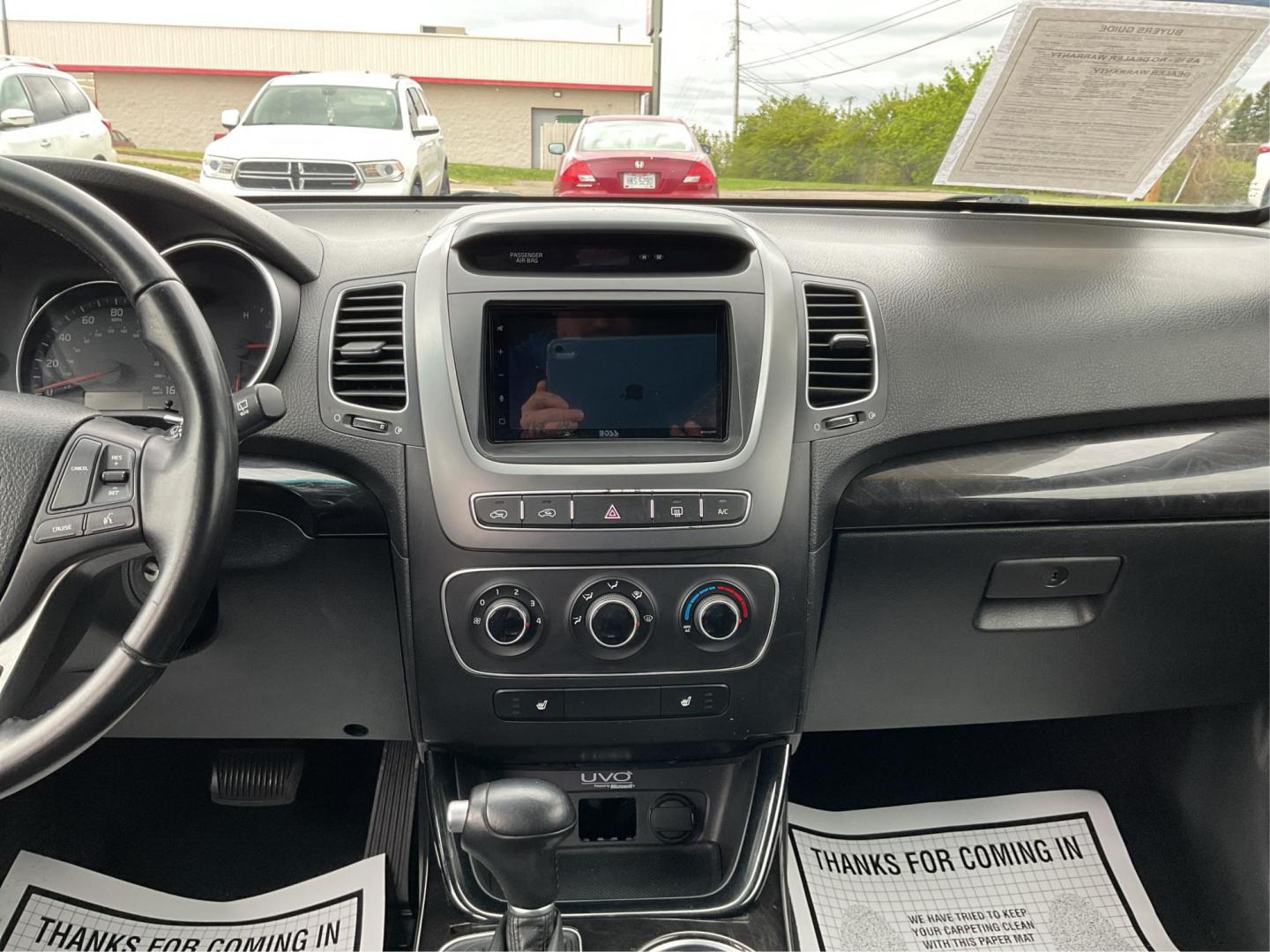 2014 Blue Kia Sorento LX 2WD (5XYKT3A64EG) with an 2.4L L4 DOHC 16V engine, 6-Speed Automatic transmission, located at 8750 N County Rd 25A, Piqua, OH, 45356, (937) 908-9800, 40.164391, -84.232513 - 2014 Kia Sorento LX 2WD - Photo#12