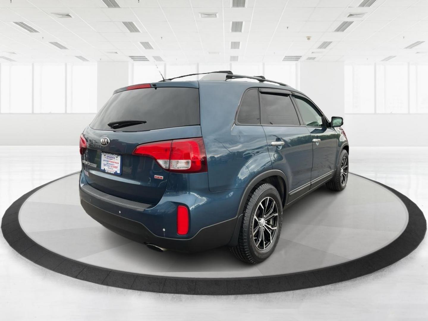 2014 Blue Kia Sorento LX 2WD (5XYKT3A64EG) with an 2.4L L4 DOHC 16V engine, 6-Speed Automatic transmission, located at 8750 N County Rd 25A, Piqua, OH, 45356, (937) 908-9800, 40.164391, -84.232513 - 2014 Kia Sorento LX 2WD - Photo#2