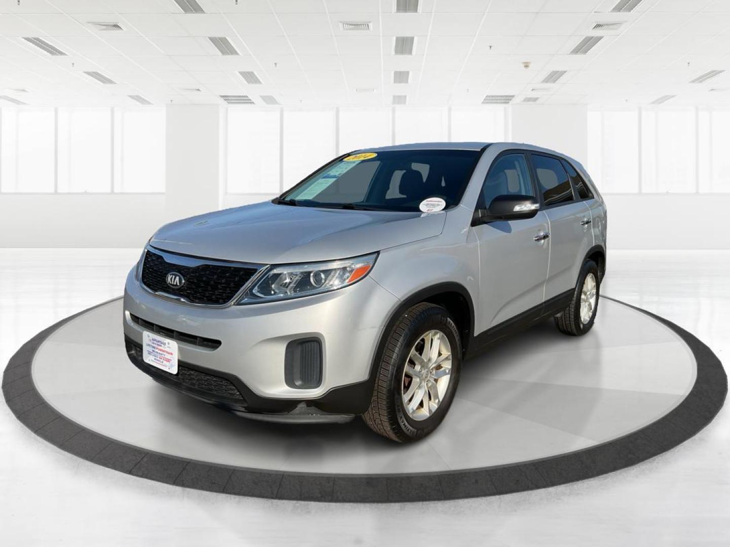 2014 Kia Sorento LX 2WD (5XYKT3A64EG) with an 2.4L L4 DOHC 16V engine, 6-Speed Automatic transmission, located at 1099 N County Rd 25A, Troy, OH, 45373, (937) 908-9800, 40.057079, -84.212883 - 2014 Kia Sorento LX 2WD - Photo#7