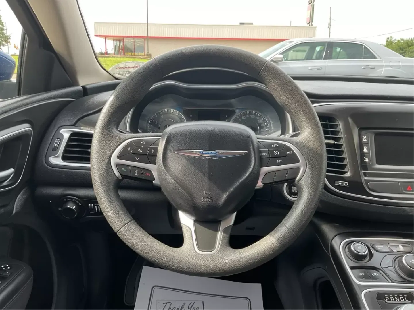 2015 Chrysler 200 Limited (1C3CCCAB1FN) with an Other engine, located at 1099 N County Rd 25A, Troy, OH, 45373, (937) 908-9800, 40.057079, -84.212883 - **Explore the Open Road with Comfort and Style in a 2015 Chrysler 200 Limited** <br /> <br /> Are you ready to elevate your daily commutes or weekend getaways? This 2015 Chrysler 200 Limited, available at Advantage Car and Credit in Fairborn, OH, is the perfect sedan for both city driving and long t - Photo#15