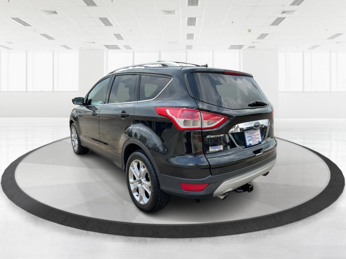 2015 Ford Escape Titanium (1FMCU9J95FU) with an Other engine, located at 1230 East Main St, Xenia, OH, 45385, (937) 908-9800, 39.688026, -83.910172 - 2015 Ford Escape Titanium - Photo#4